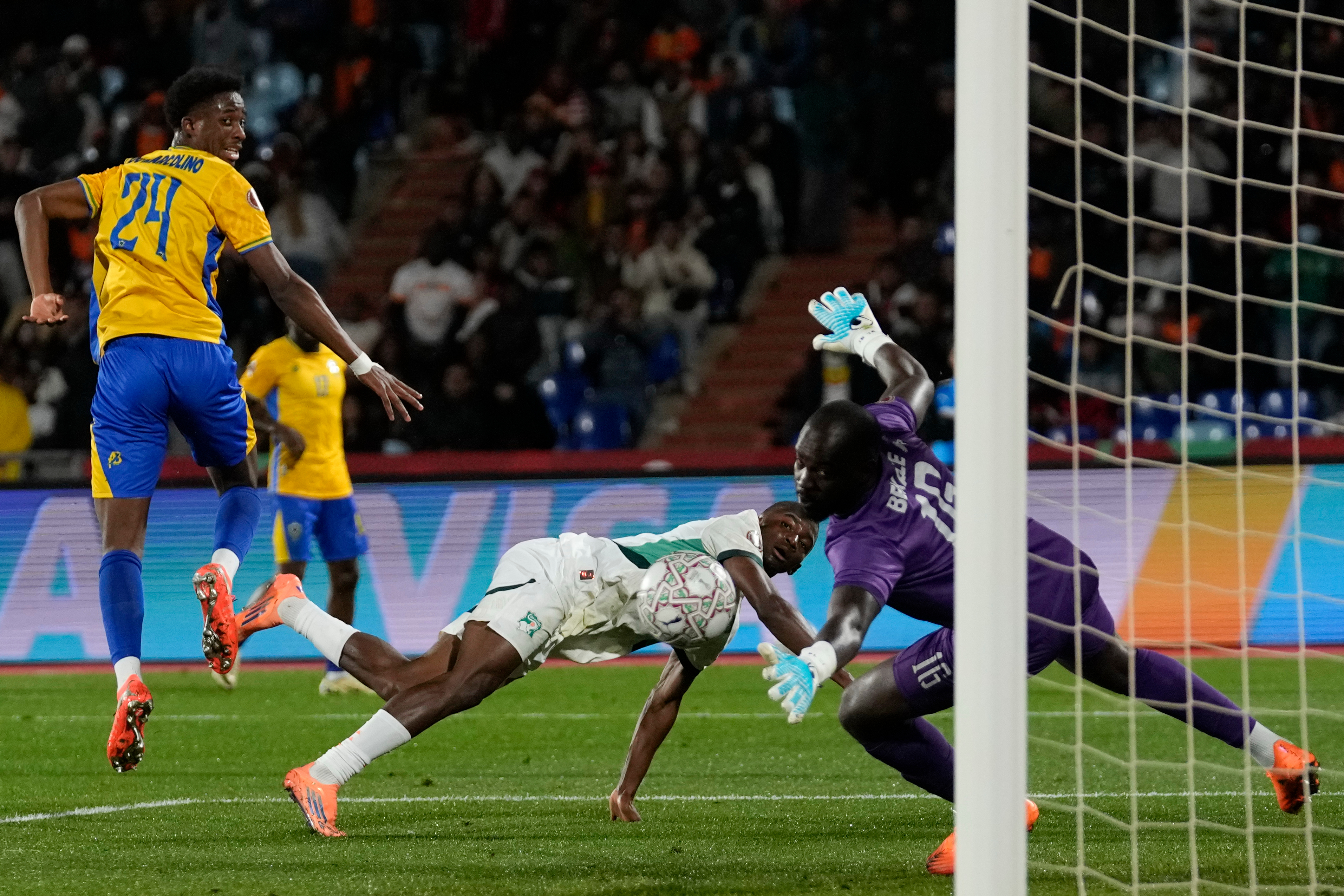 Ivory Coast's Bazoumana Touré scores during the Africa Cup of Nations group F soccer match between Gabon and Ivory Coast, in Marrakech, Morocco, Wednesday, Dec. 31, 2025. (AP Photo/Themba Hadebe)