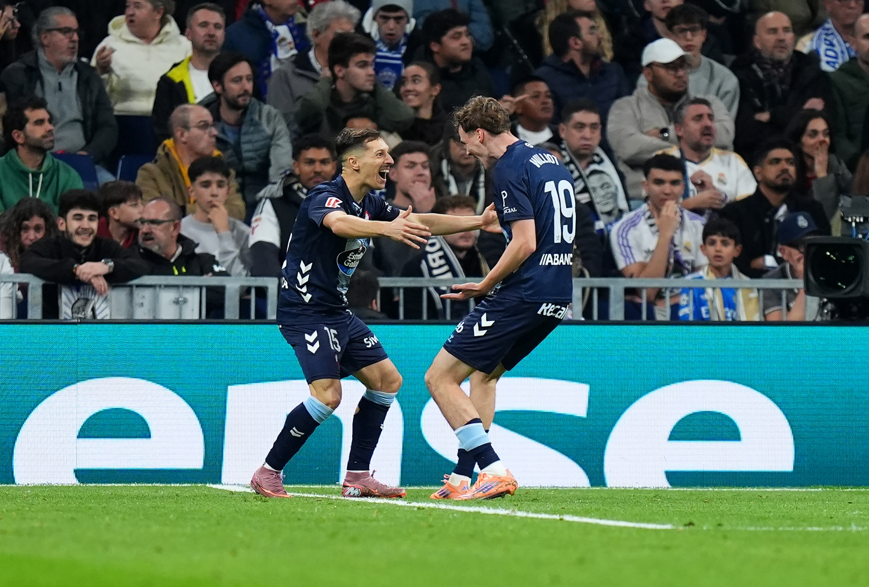MADRID, SPAIN - DECEMBER 07: Williot Swedberg of Celta Vigo celebrates scoring his team's first goal with teammate Bryan Zaragoza during the LaLiga EA Sports match between Real Madrid CF and RC Celta de Vigo at Estadio Santiago Bernabeu on December 07, 2025 in Madrid, Spain. (Photo by Angel Martinez/Getty Images)