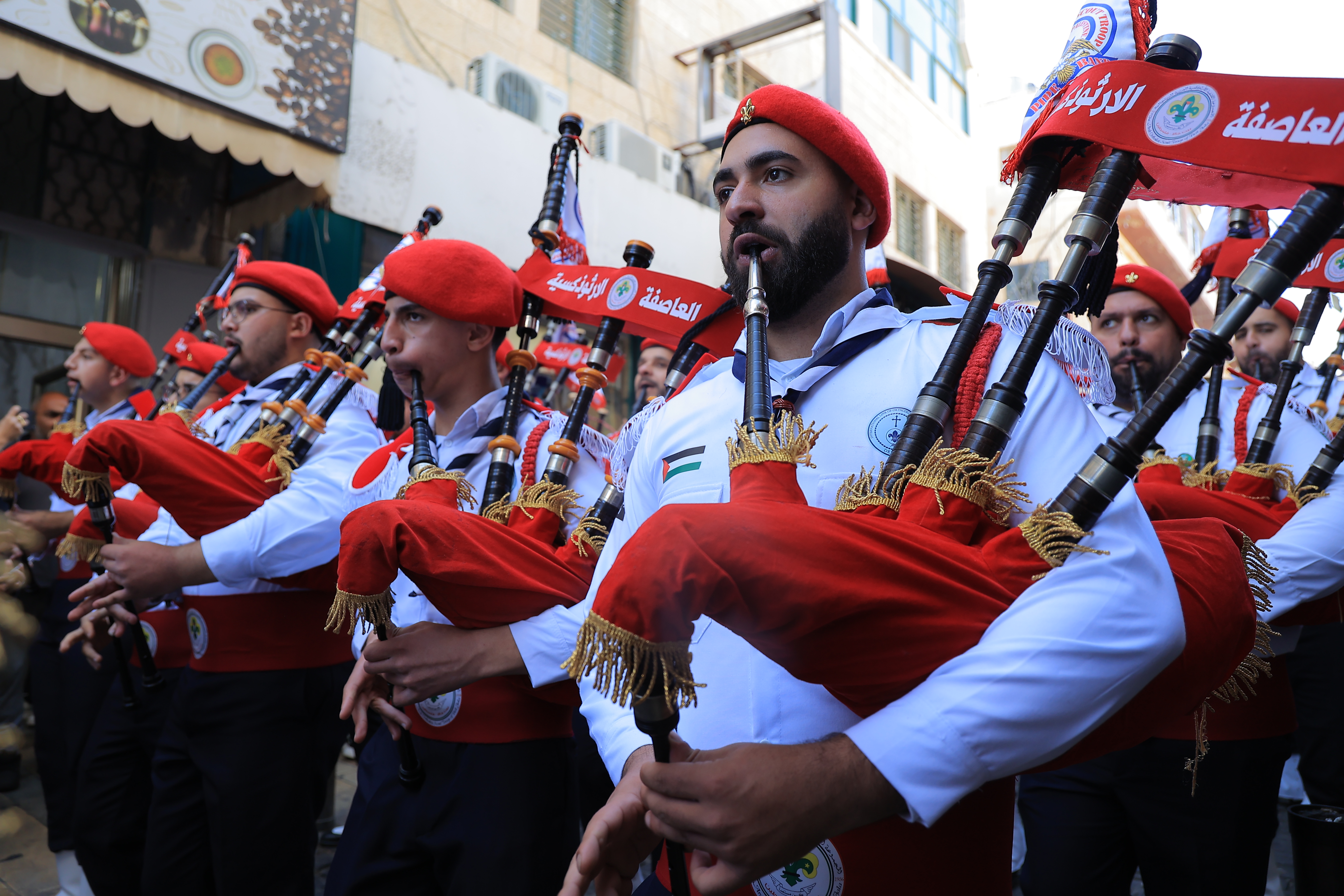 Palestinians play bagpipes
