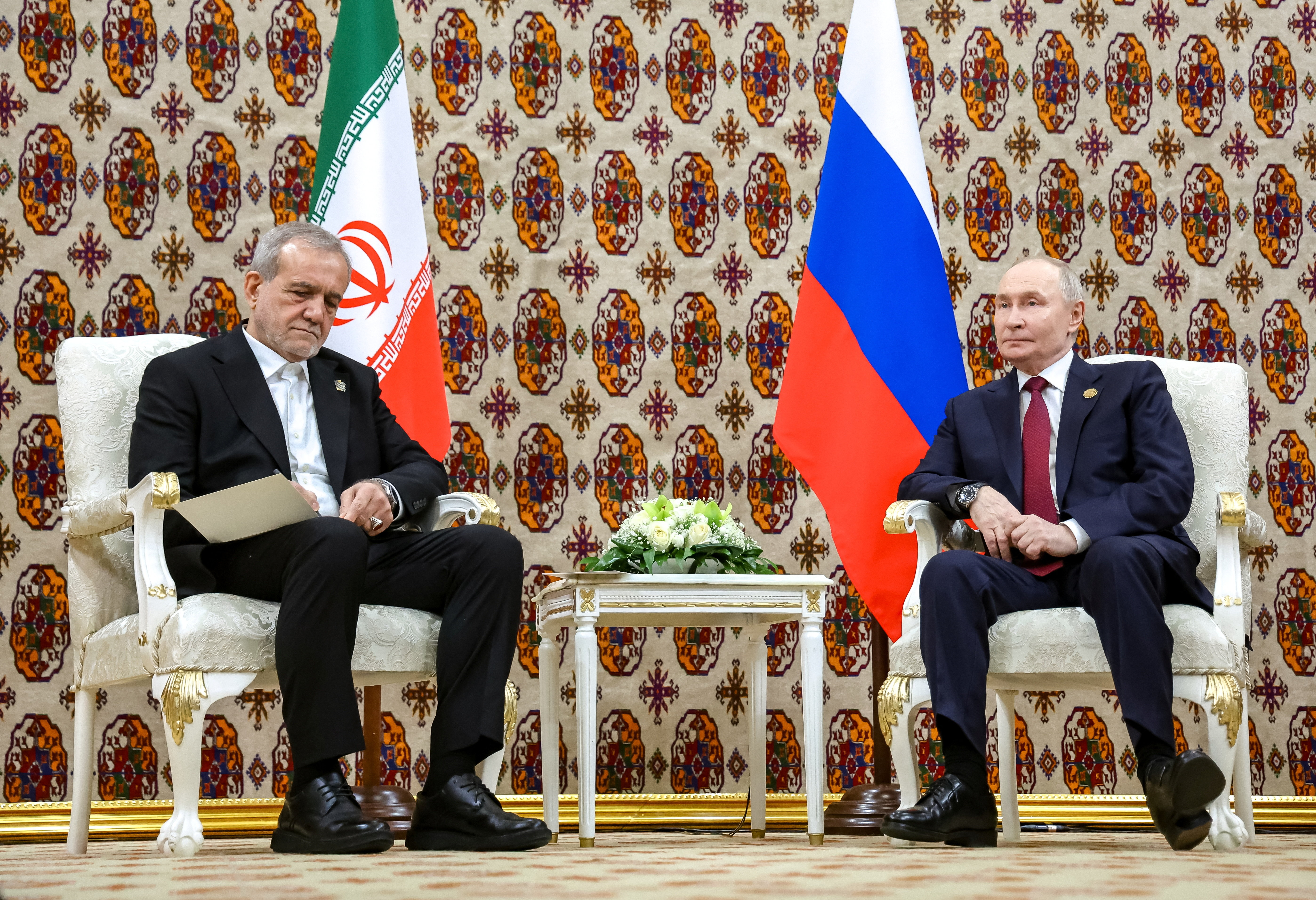 Russian President Vladimir Putin and Iranian President Masoud Pezeshkian attend a meeting in Ashgabat, Turkmenistan
