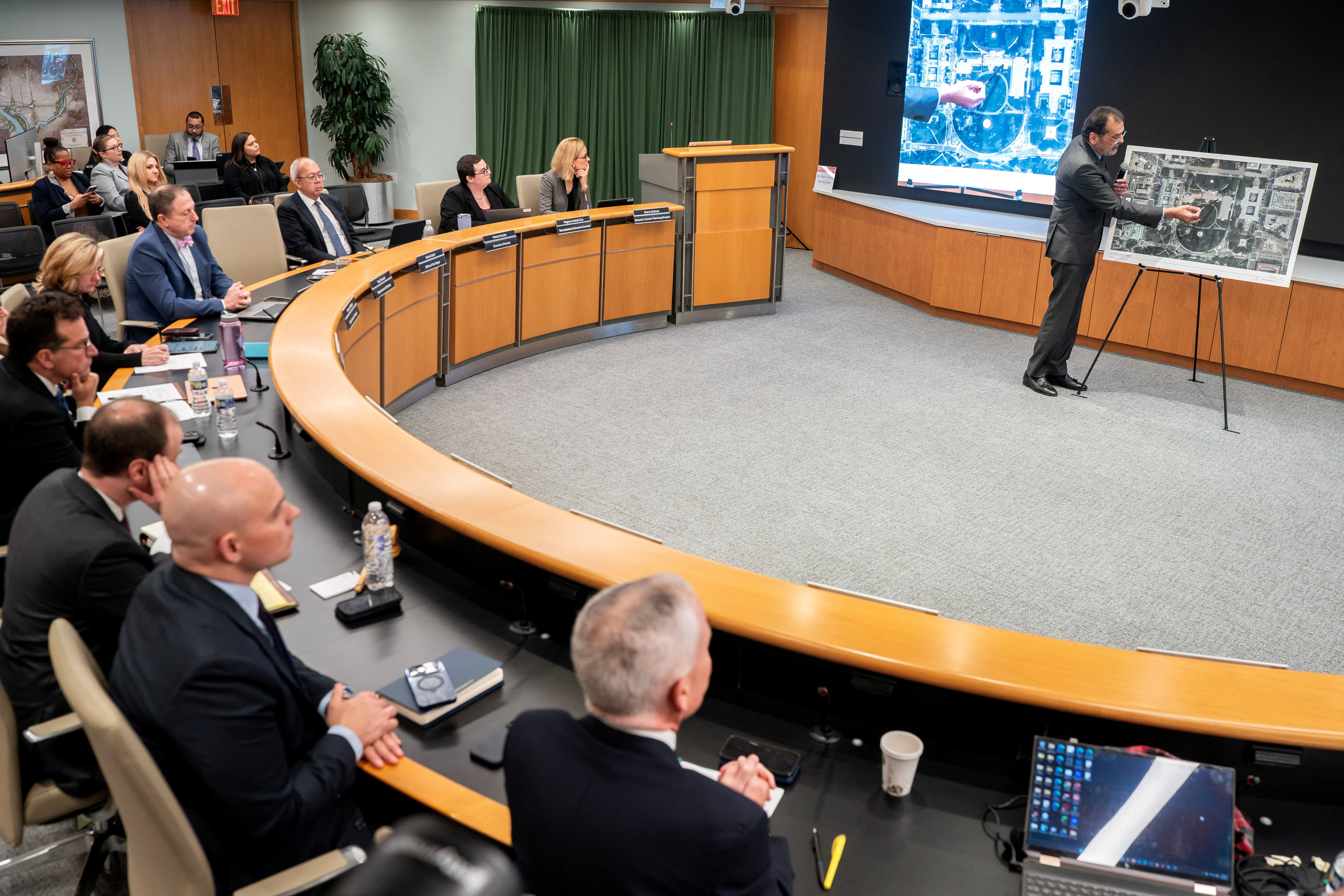 A building committee reviews Trump's plans