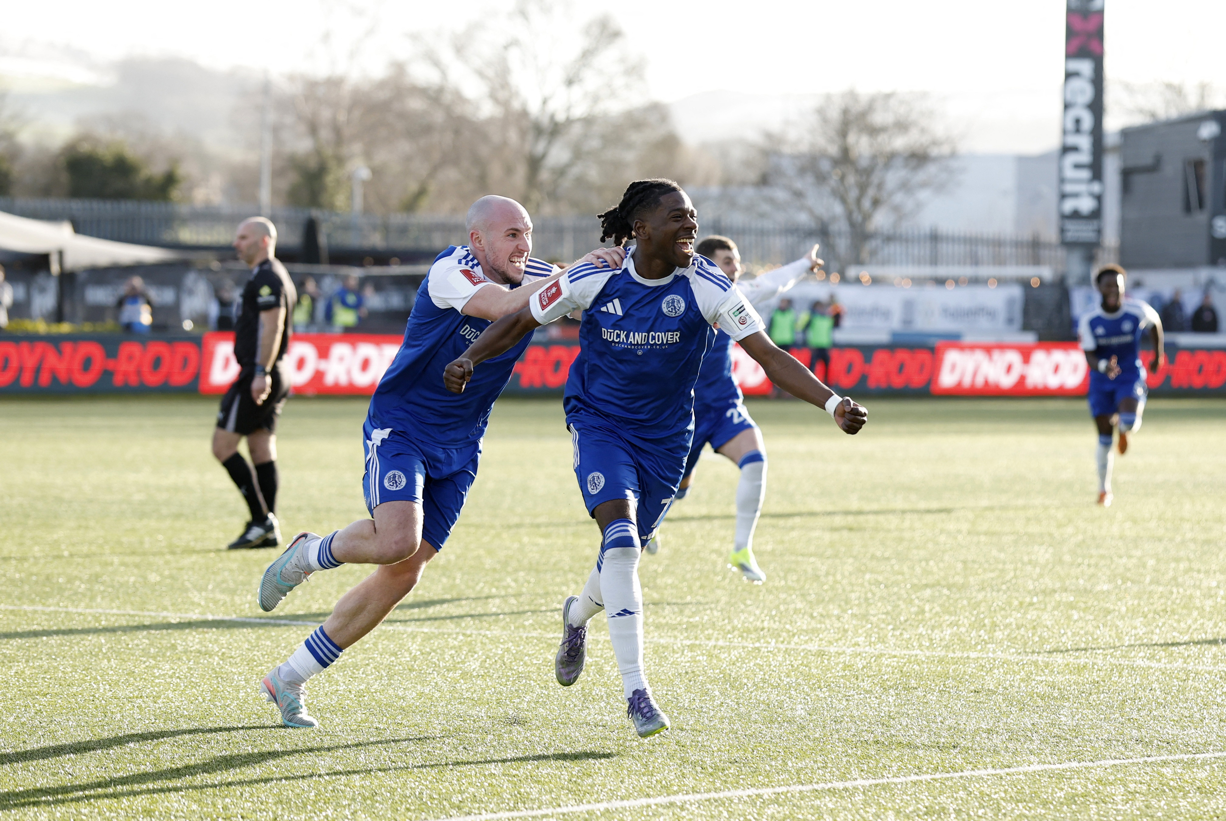Macclesfield F.C.'s Isaac Buckley-Ricketts celebrates scoring their second goal with Josh Kay