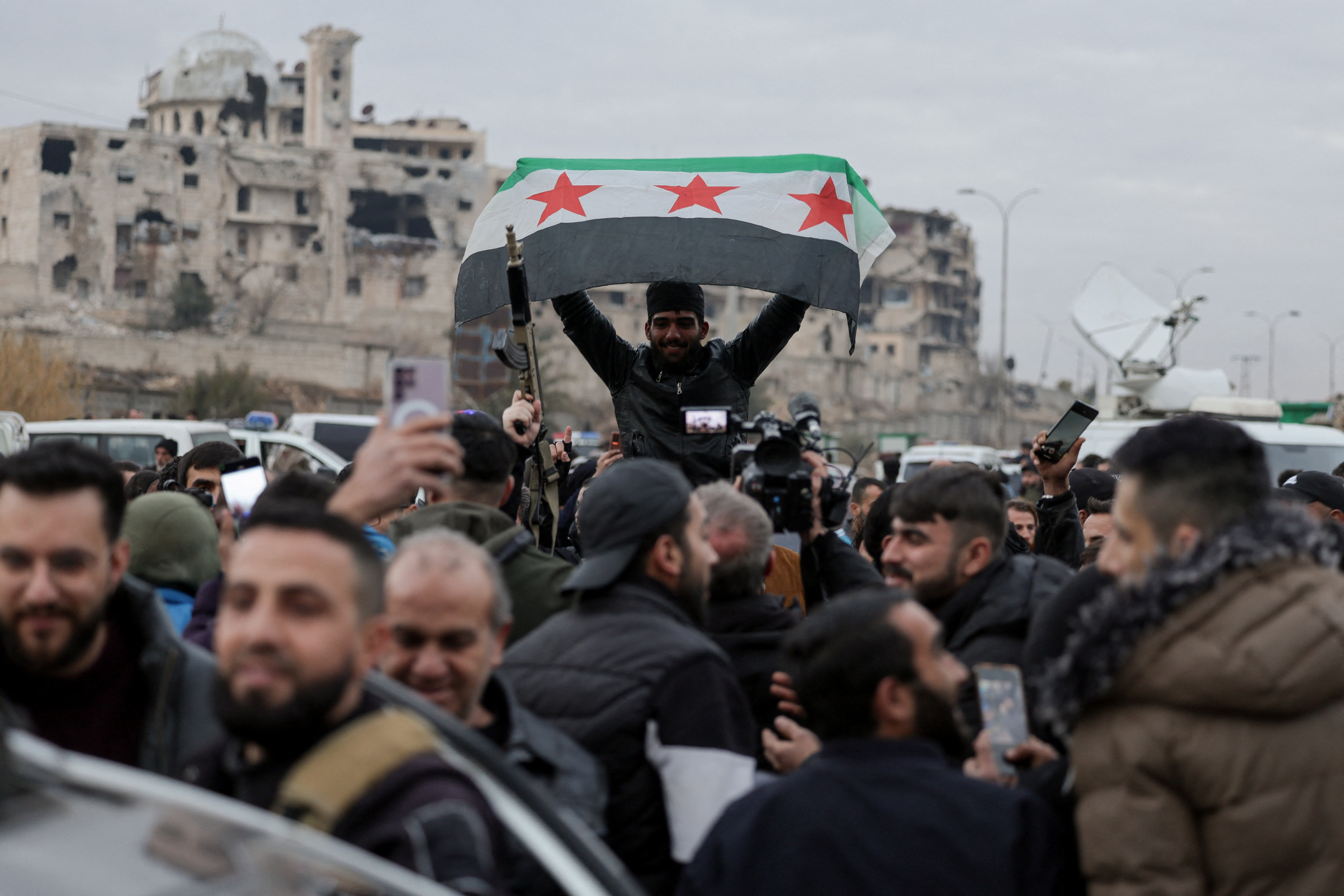 People celebrate in Sheikh Maksoud neighbourhood following the collapse of an agreement between the Syrian government and the Syrian Democratic Forces (SDF), in Aleppo, Syria, January 10, 2026.
