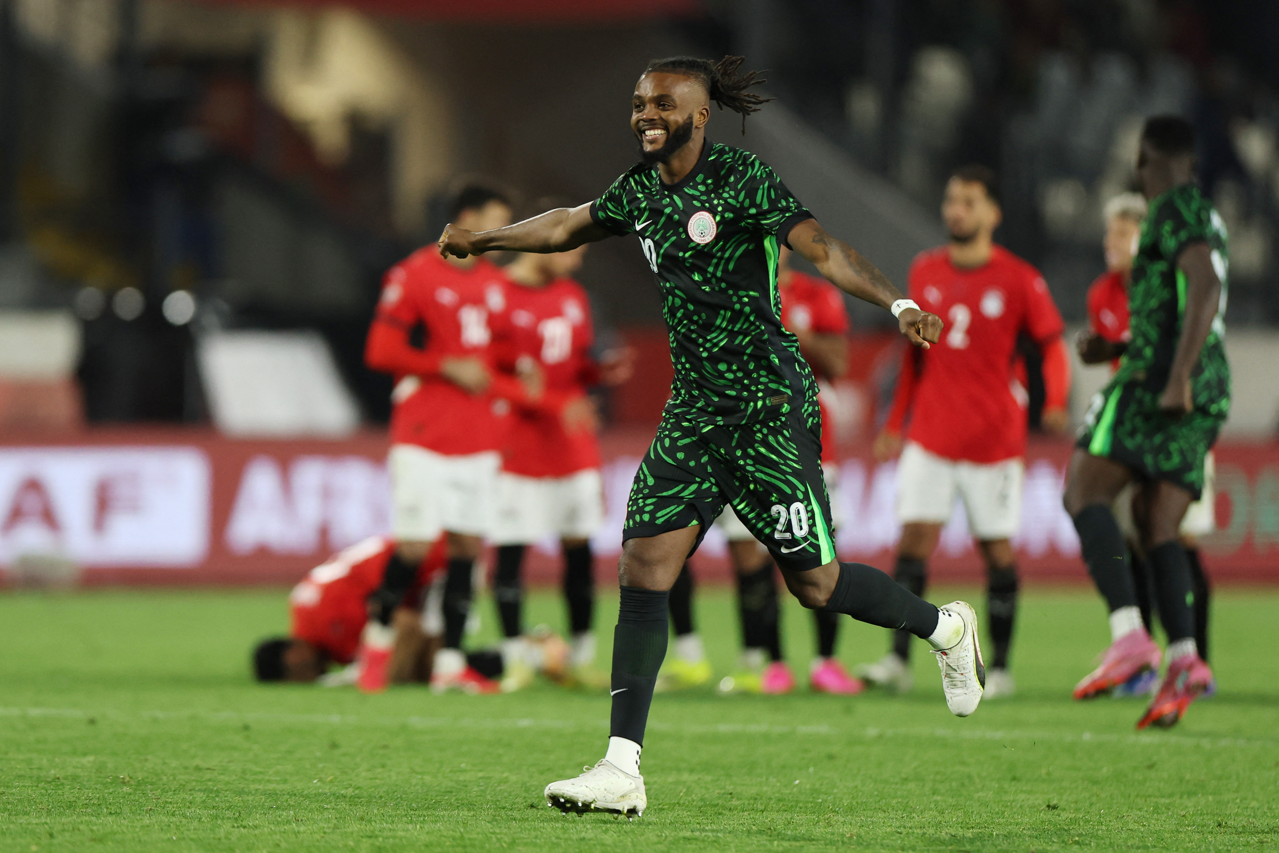 Nigeria's Chidozie Awaziem celebrates after winning the penalty shootout
