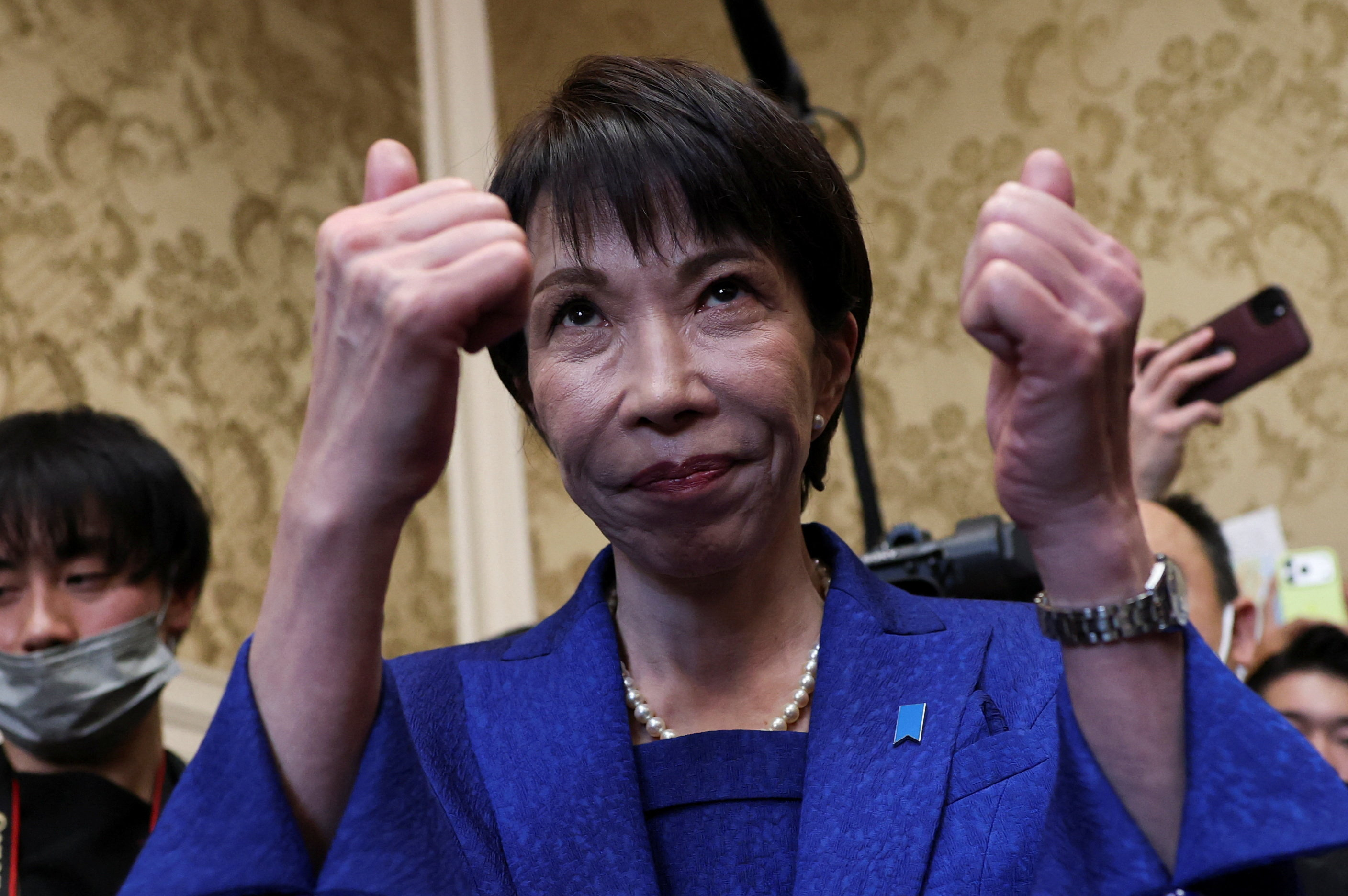 Japan's Prime Minister Sanae Takaichi gestures.
