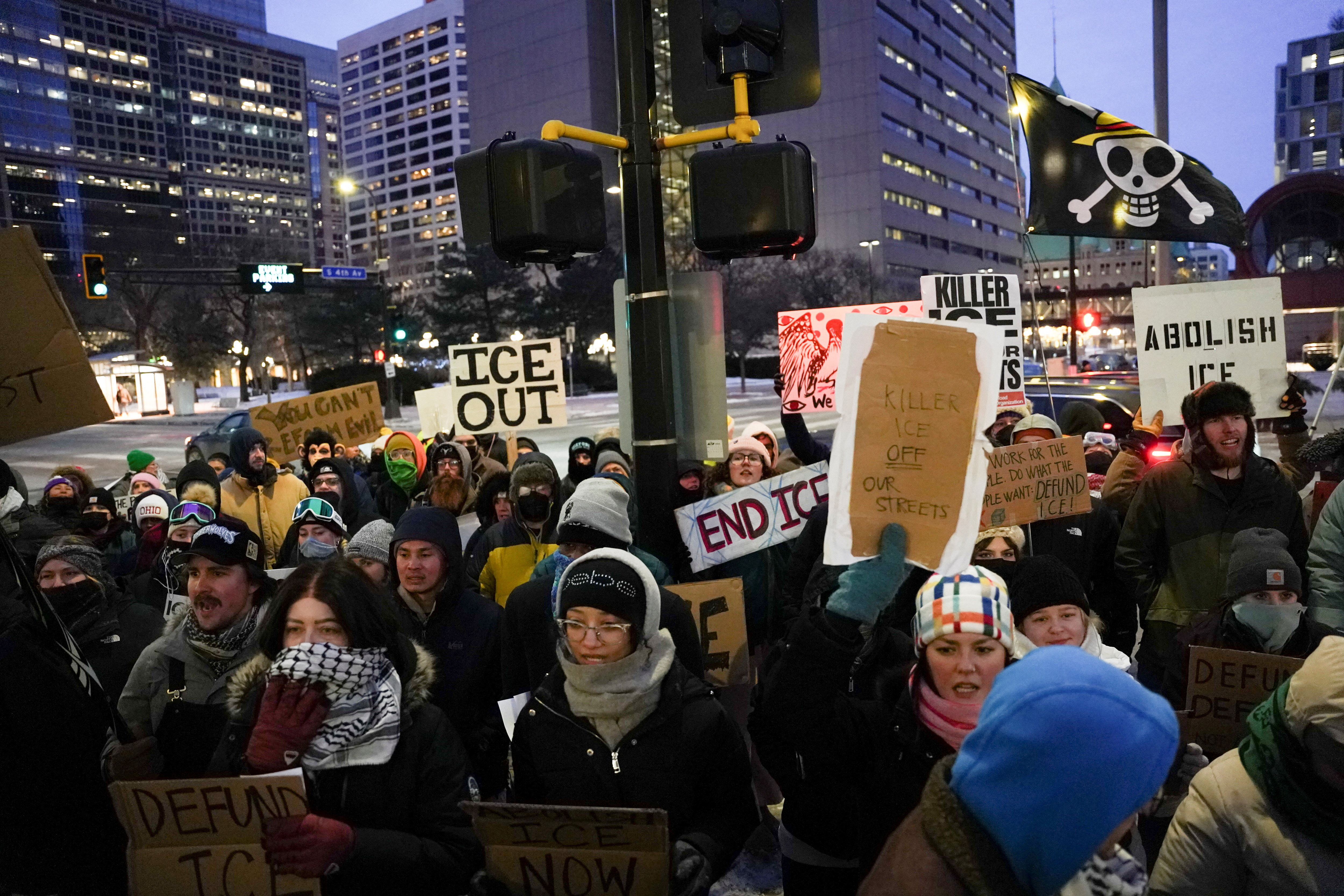 People protest against immigration enforcement actions during a rally outside US Senator Amy Klobuchar's office in Minneapolis, Minnesota