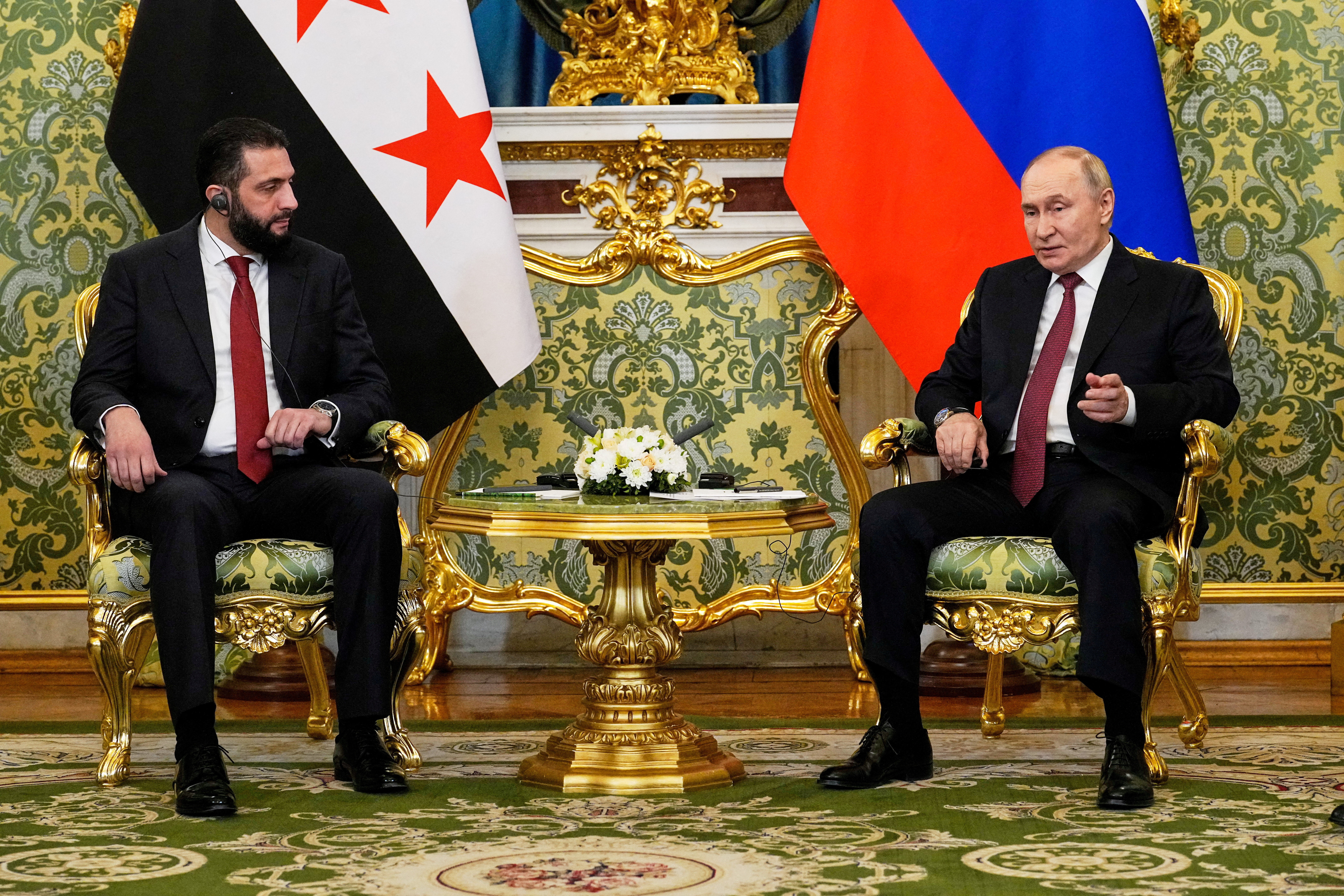 Russia's President Vladimir Putin and Syria's President Ahmed al-Sharaa