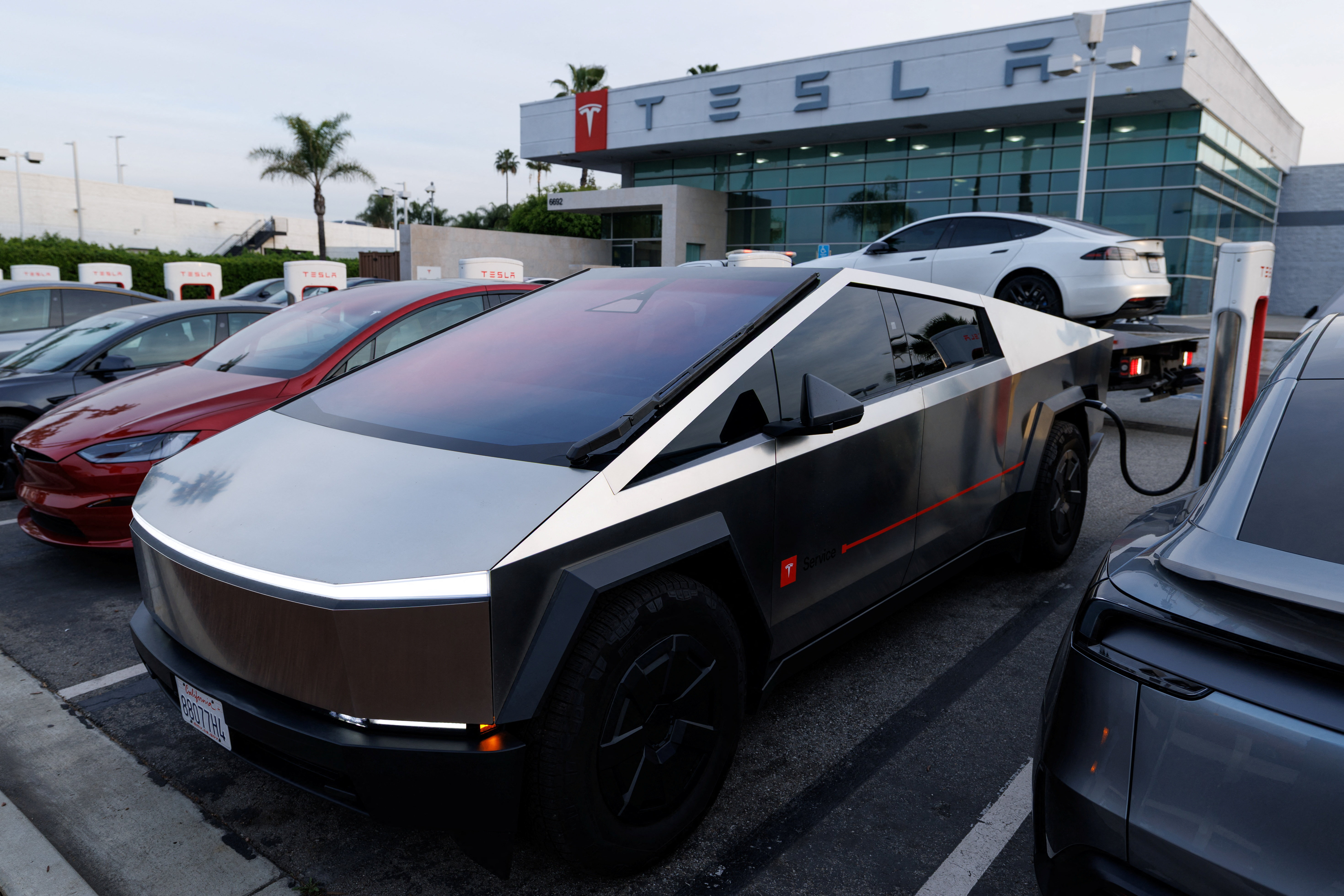Tesla vehicles are show at a Tesla dealership in Buena Park, California, U.S., January 28, 2026. REUTERS/Mike Blake