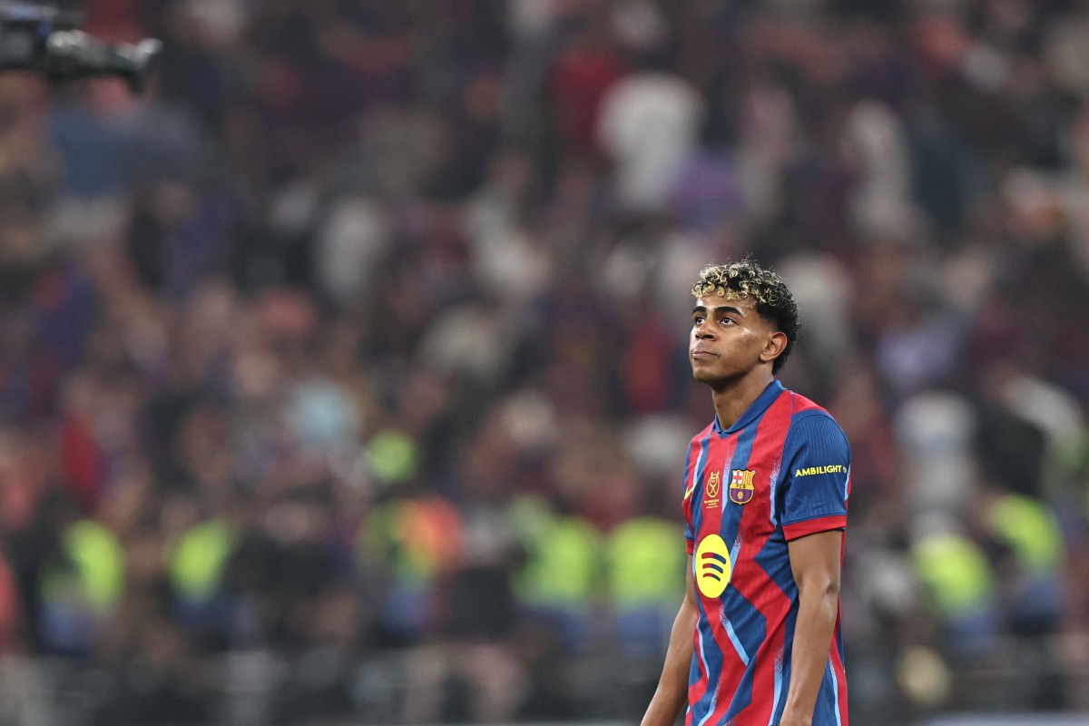 Barcelona's Spanish forward #10 Lamine Yamal looks on after the Spanish Supercup semi-final football match between FC Barcelona and Athletic Bilbao at King Abdullah Sports City in Jeddah on January 7, 2026. (Photo by Fadel SENNA / AFP)