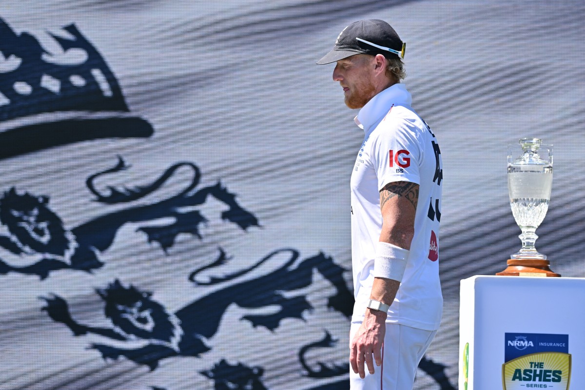 Englands Ben Stokes walks past the trophy during the presentation ceremony at the end of the fifth Ashes cricket Test between Australia and England at the Sydney Cricket Ground in Sydney on January 8, 2026. (Photo by Saeed KHAN / AFP) / -- IMAGE RESTRICTED TO EDITORIAL USE - STRICTLY NO COMMERCIAL USE --