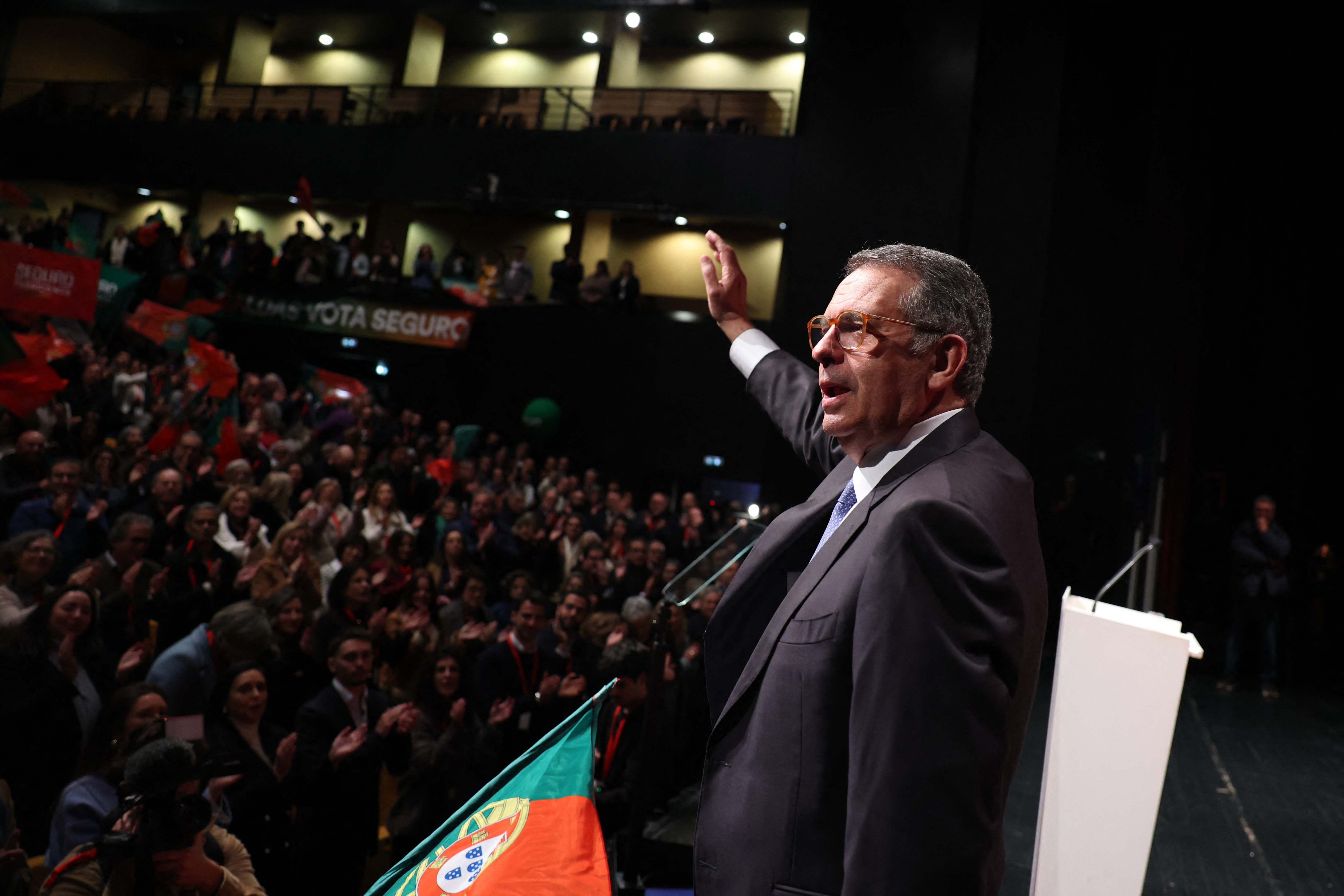 Socialist candidate Jose Antonio Seguro waves as he addresses supporters on the night of Portugal's presidential election first round in Caldas da Rainha on January 18, 2026. Portugal's socialist candidate won the first round of the presidential election and will face the far-right candidate in the second round, near-complete results showed today. With votes from 95 percent of constituencies counted, Socialist Antonio Jose Seguro was leading with 30.6 percent of the vote, while far-right contender Andre Ventura came in second with 24.2 percent. (Photo by PATRICIA DE MELO MOREIRA / AFP)