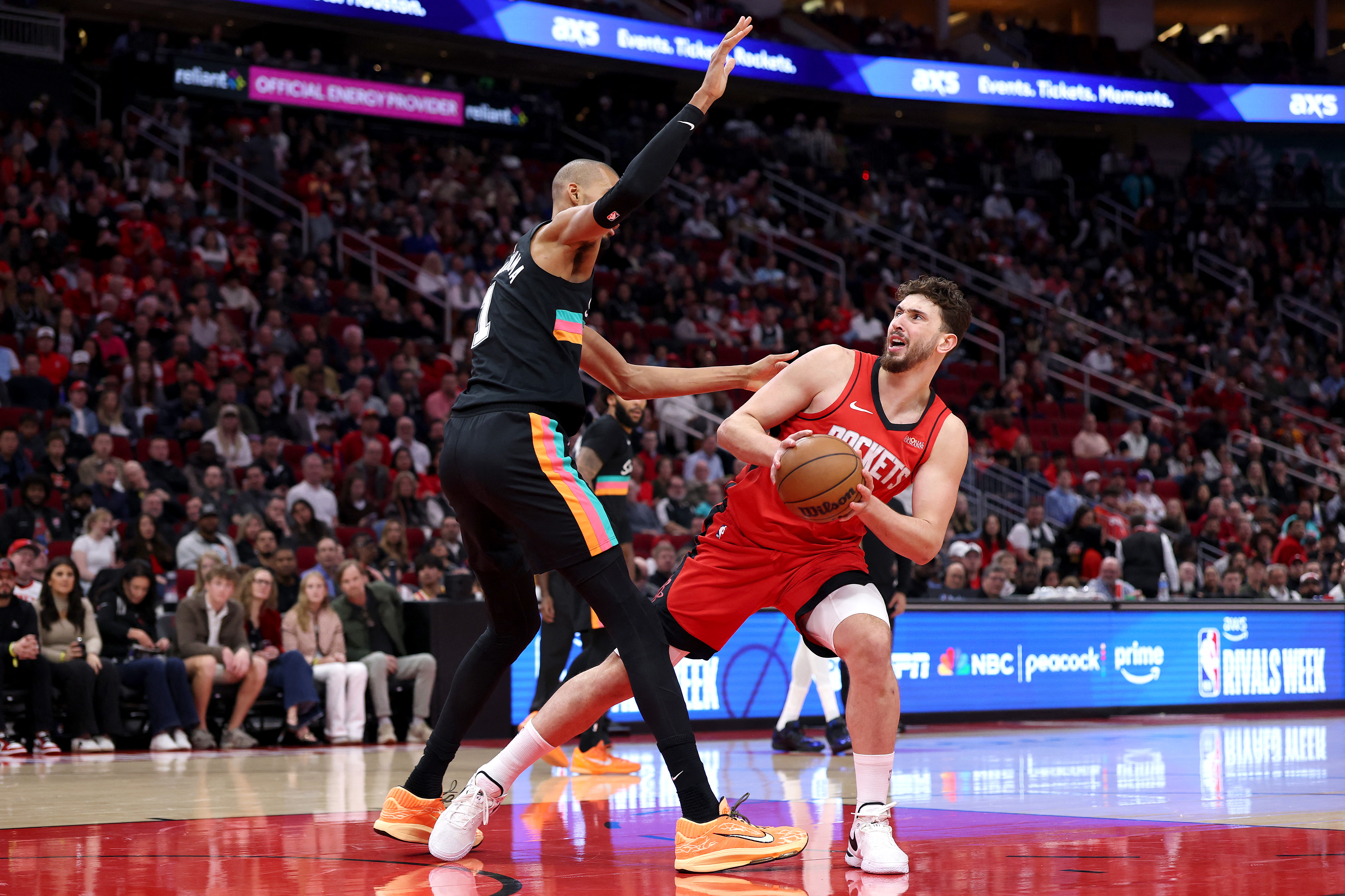 Alperen Sengun and Victor Wembanyama in action.