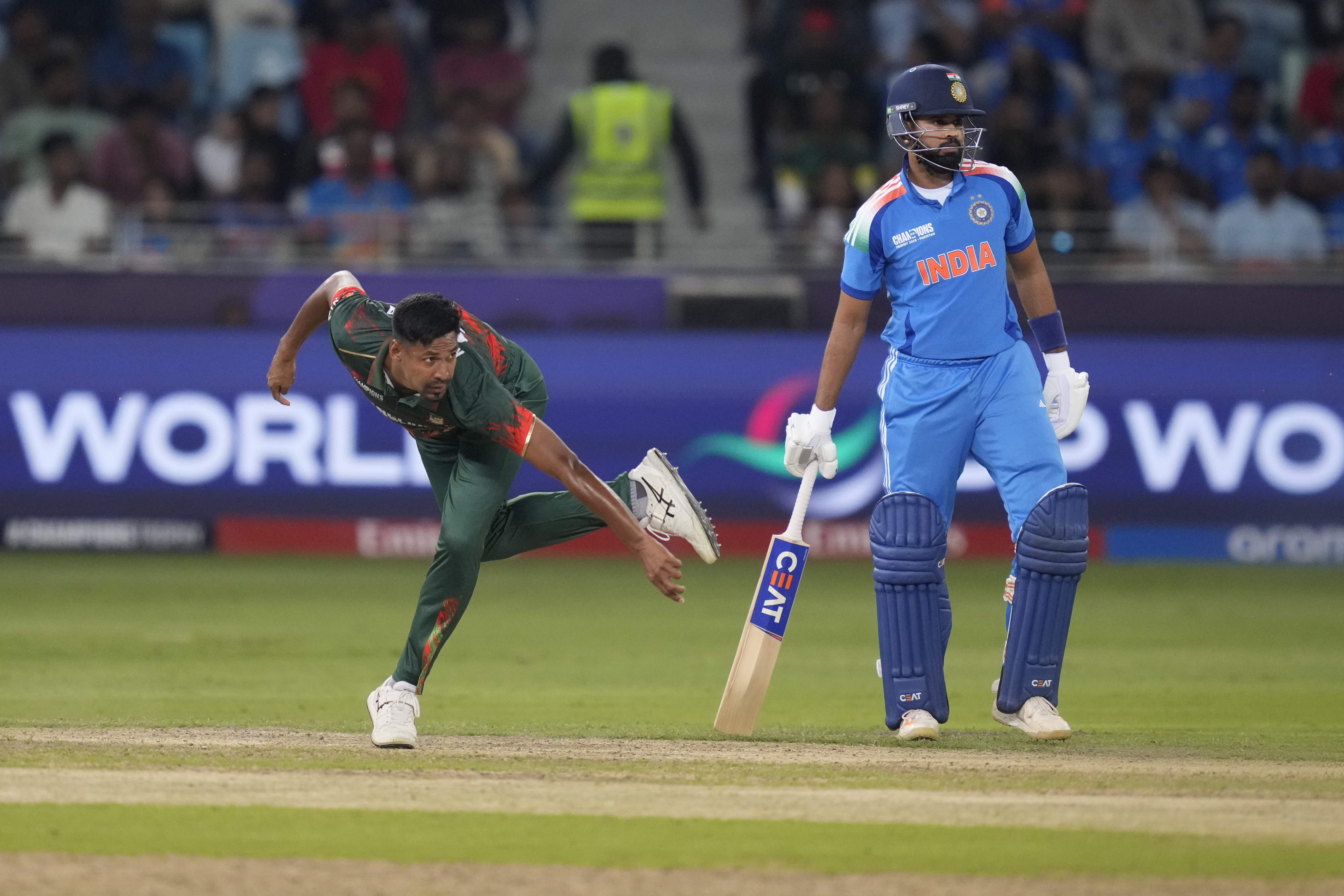 Bangladesh's Mustafizur Rahman bowls a delivery during the ICC Champions Trophy cricket match between India and Bangladesh at Dubai International Cricket Stadium in Dubai, United Arab Emirates, Thursday, Feb. 20, 2025. (AP Photo/Altaf Qadri)