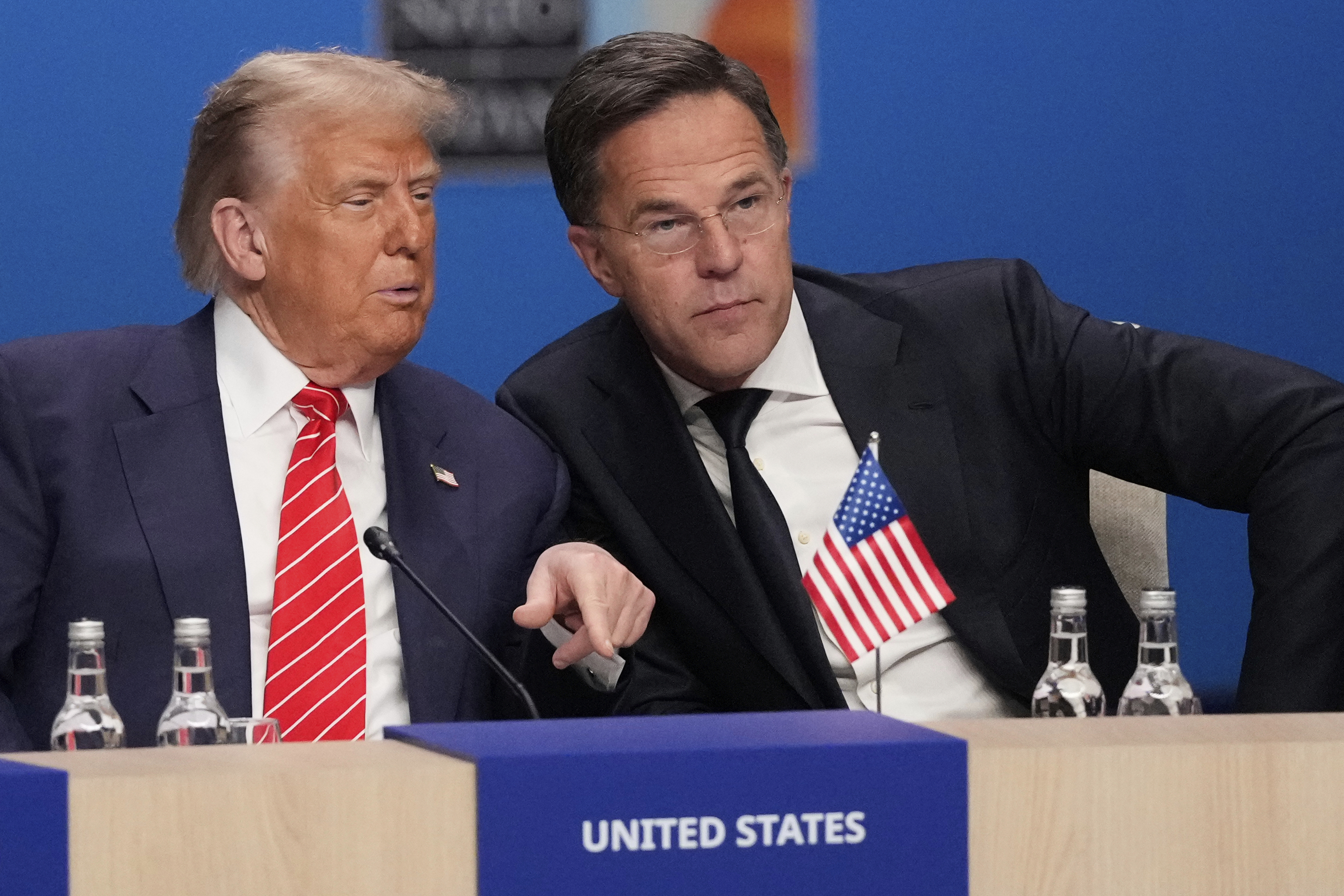 Trump and Mark Rutte sit together at NATO summit