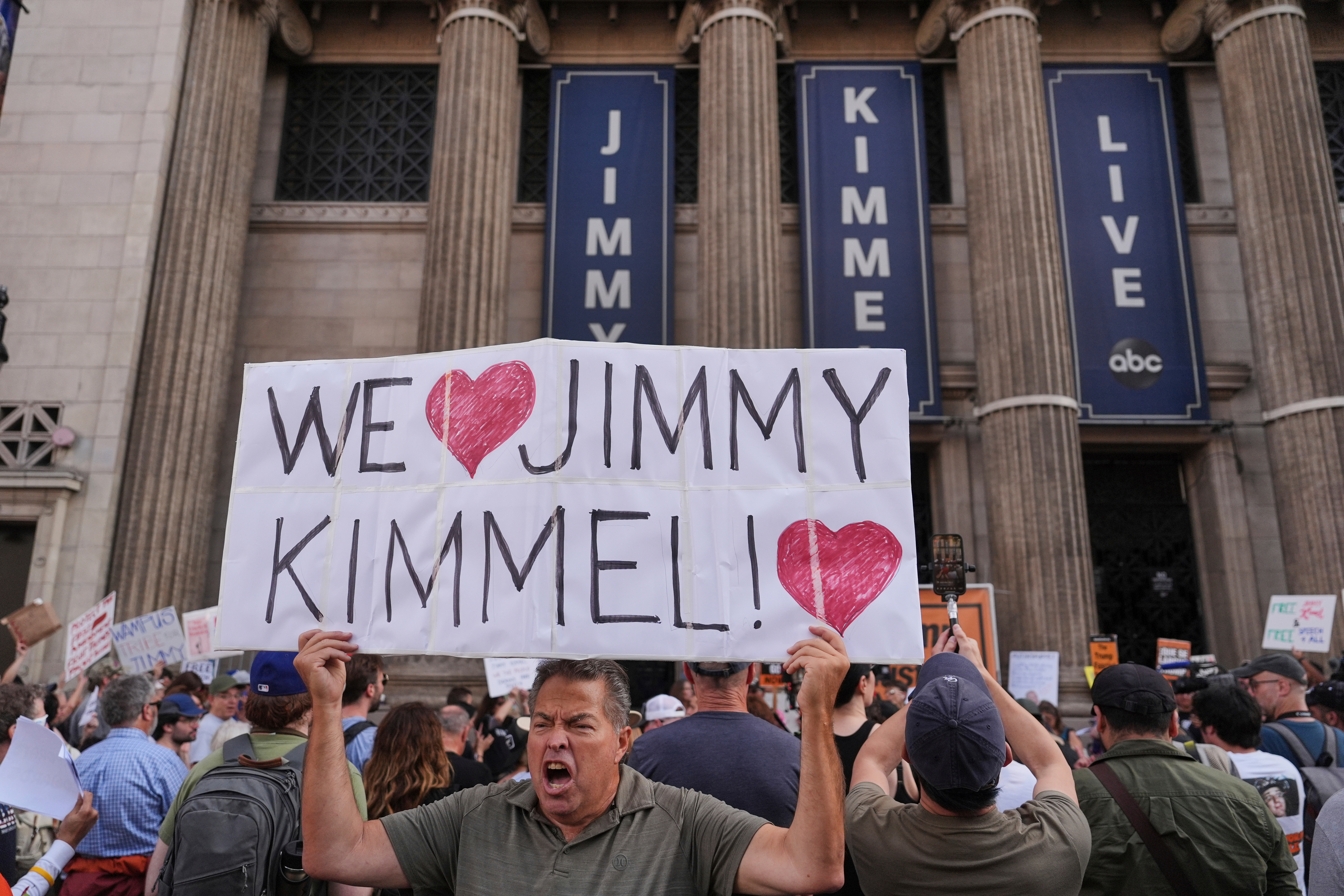Protesters demonstrate in support of Jimmy Kimmel outside his show's filming location.