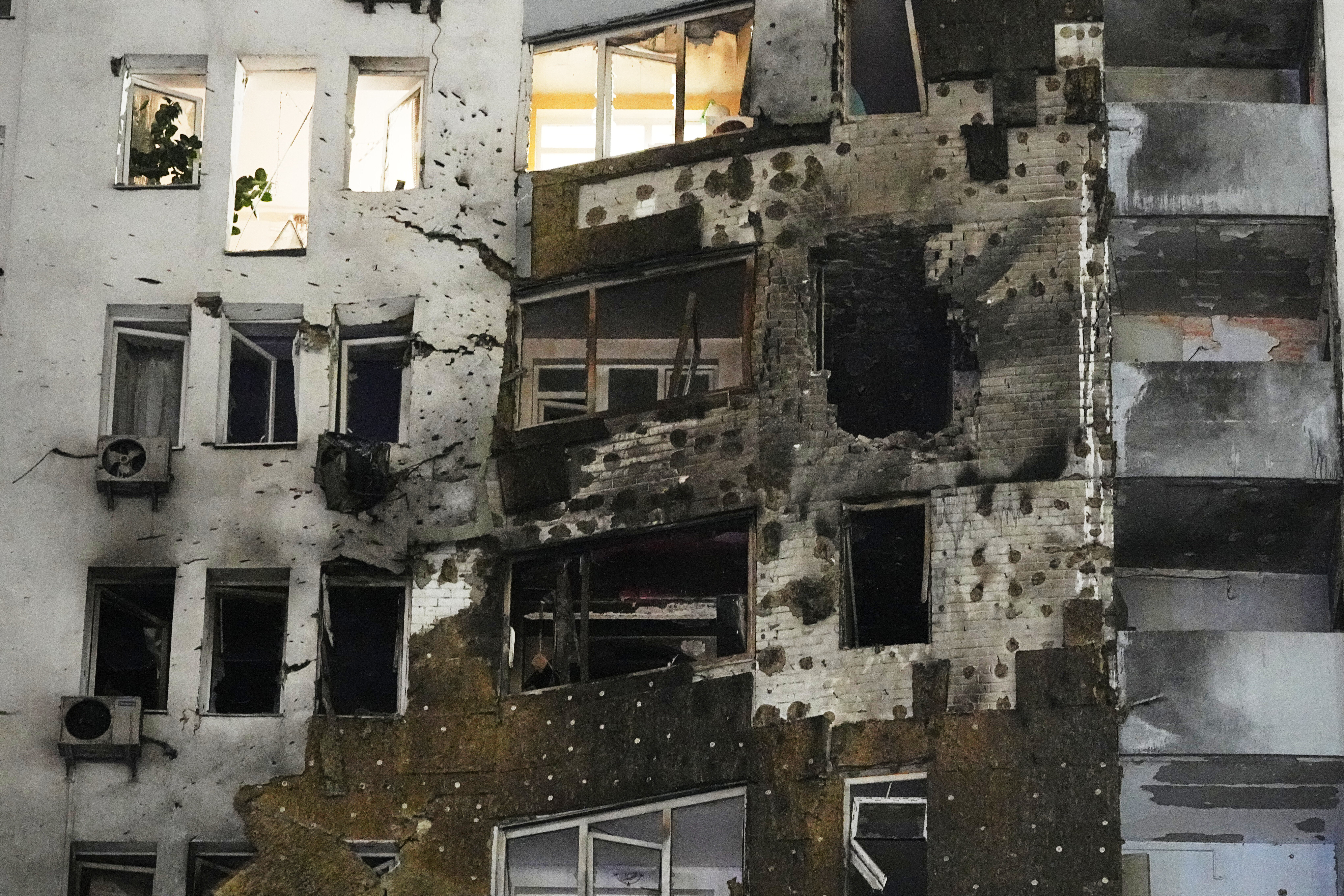 A building in Ukraine is blasted apart by a Russian attack.