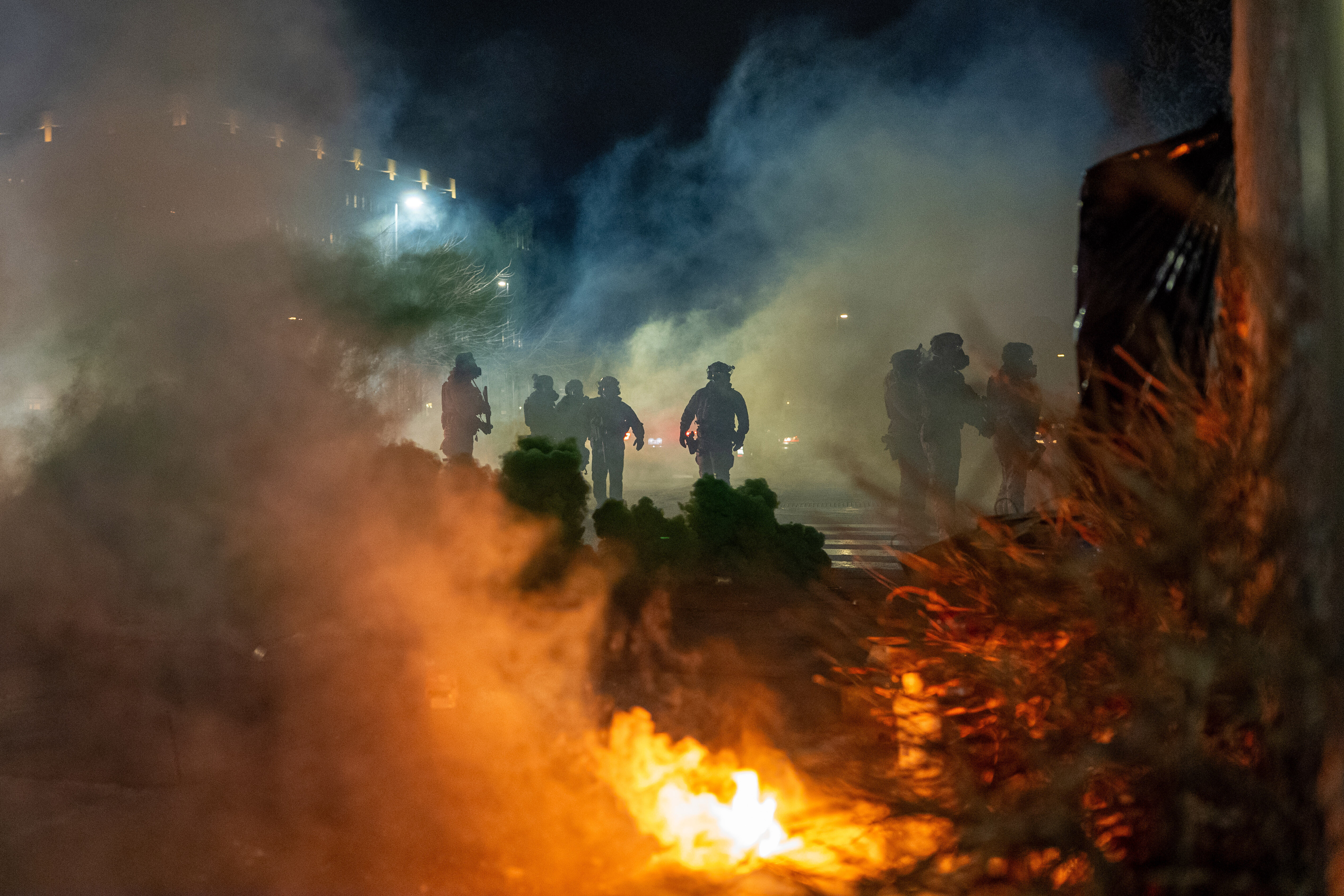 Tensions flare in Minnesota as protesters and federal agents square off