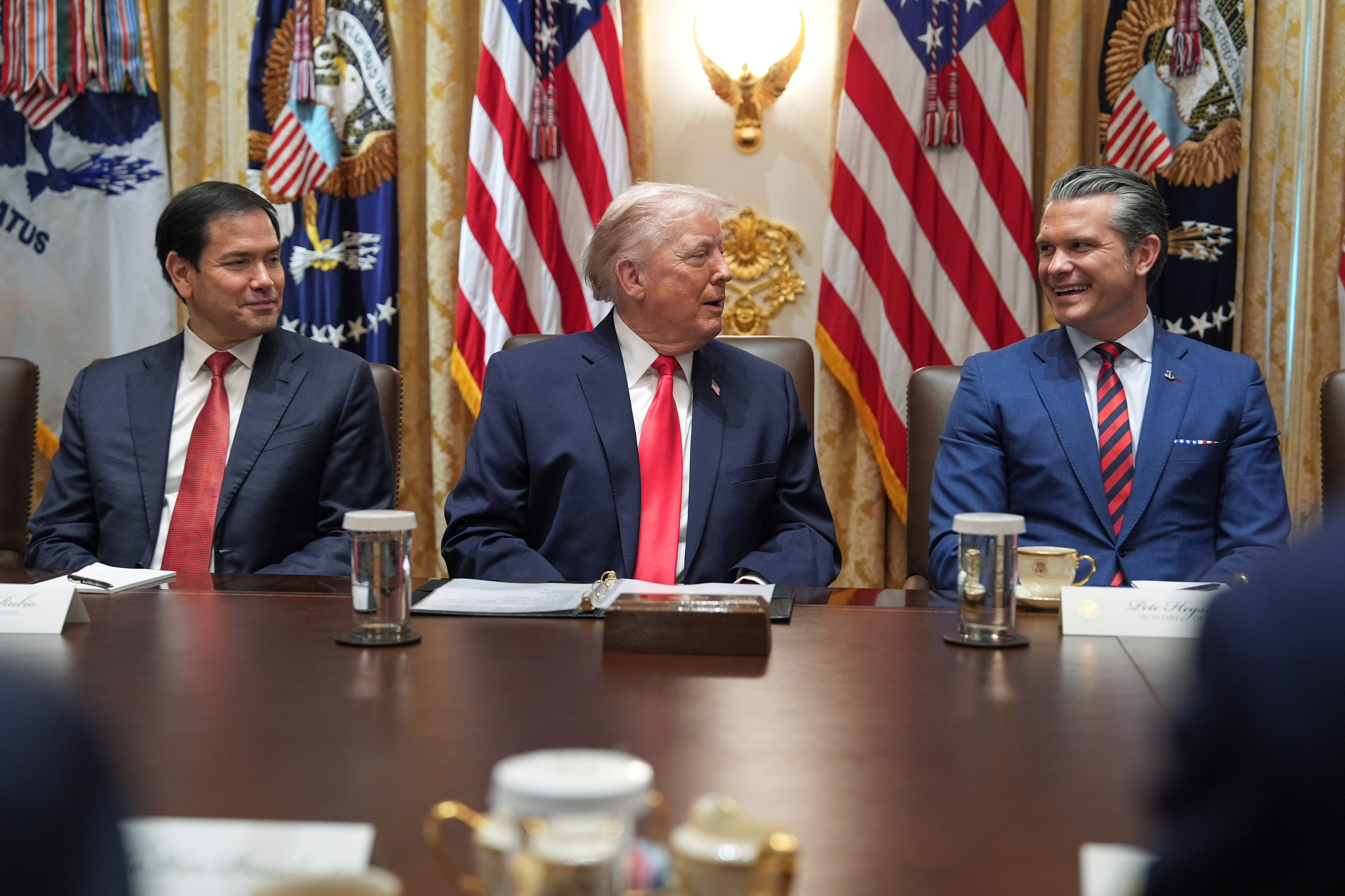 Donald Trump at a cabinet meeting in late January, with Marco Rubio and Pete Hegseth
