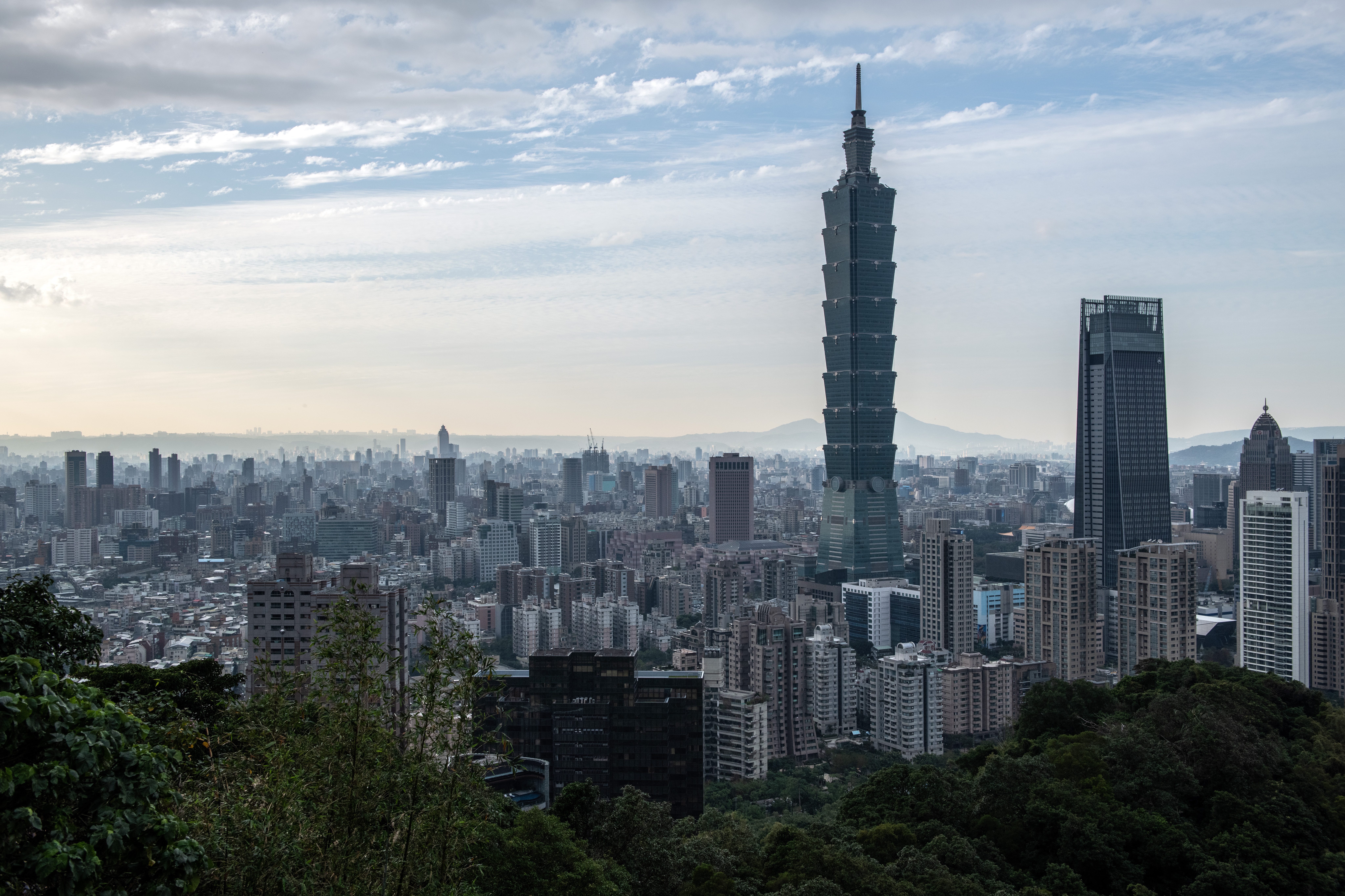 The Taipei 101 tower is seen against the Taipei skyline.