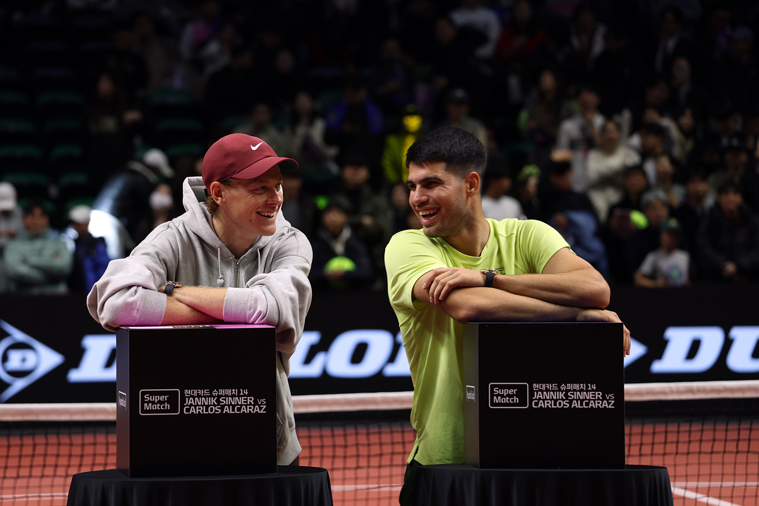 Jannik Sinner and Carlos Alcaraz react.