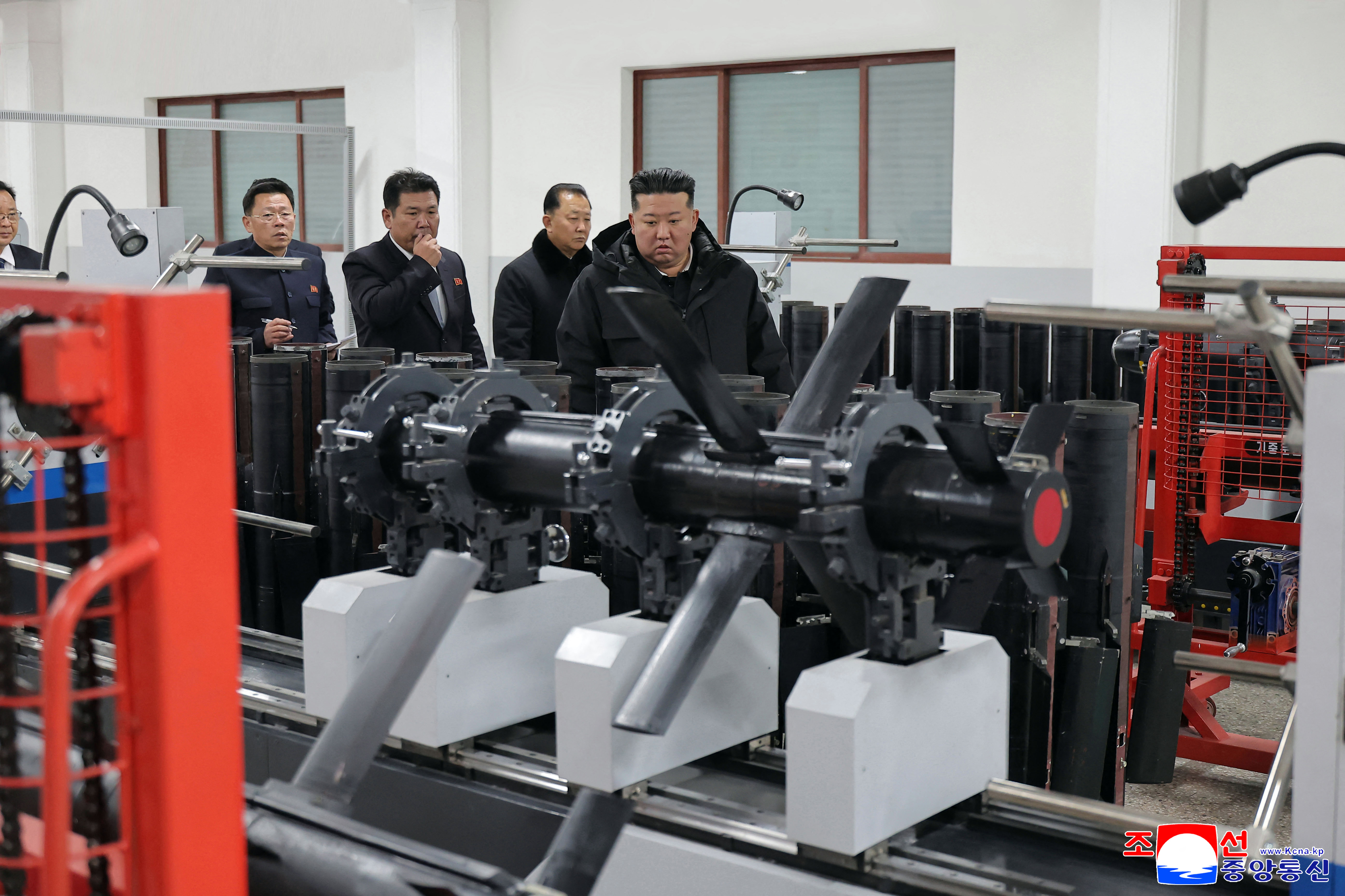 North Korean leader Kim Jong Un visiting a factory involved in making tactical guided weapons at an undisclosed place in North Korea