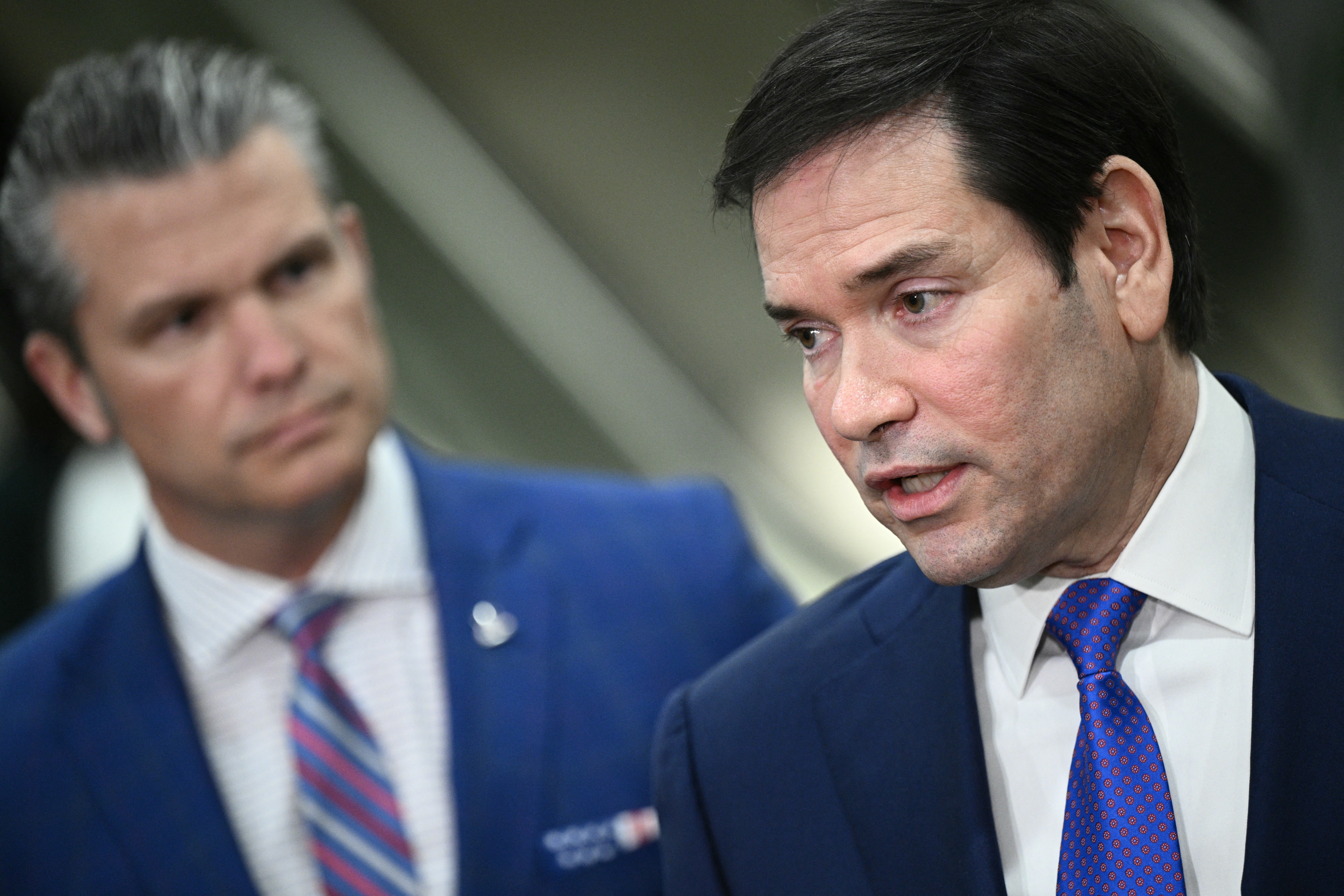 (L/R) US Secretary of Defense Pete Hegseth and US Secretary of State Marco Rubio speak to reporters after they briefed Senators on the recent US military actions in Venezuela, on Capitol Hill in Washington, DC on January 7, 2026. (Photo by Brendan SMIALOWSKI / AFP)