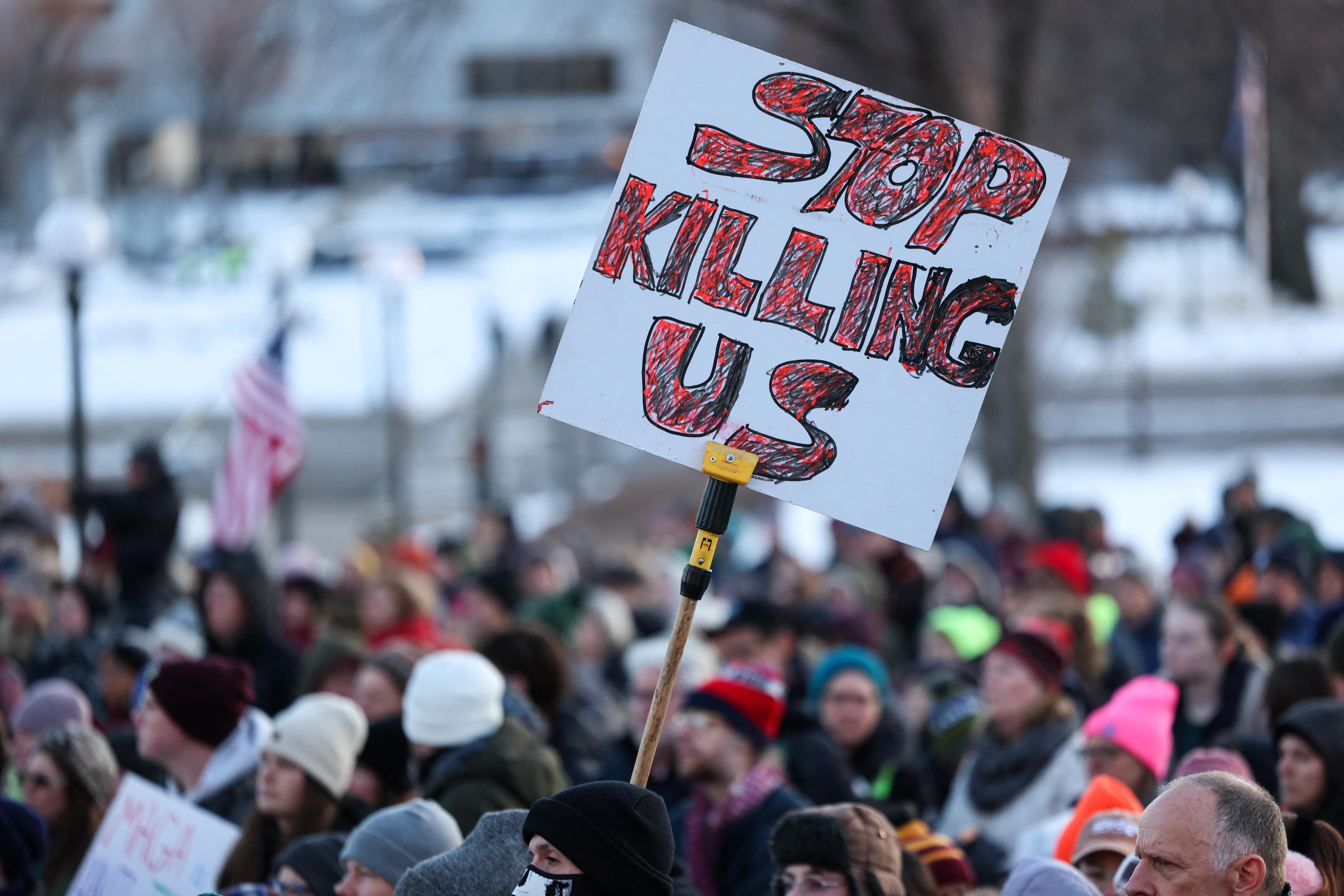 People gather in front of the Minnesota State Capitol during a demonstration over the fatal shooting of Renee Good by a US Immigration and Customs Enforcement (ICE) agent in Saint Paul, Minnesota, on January 9, 2026.