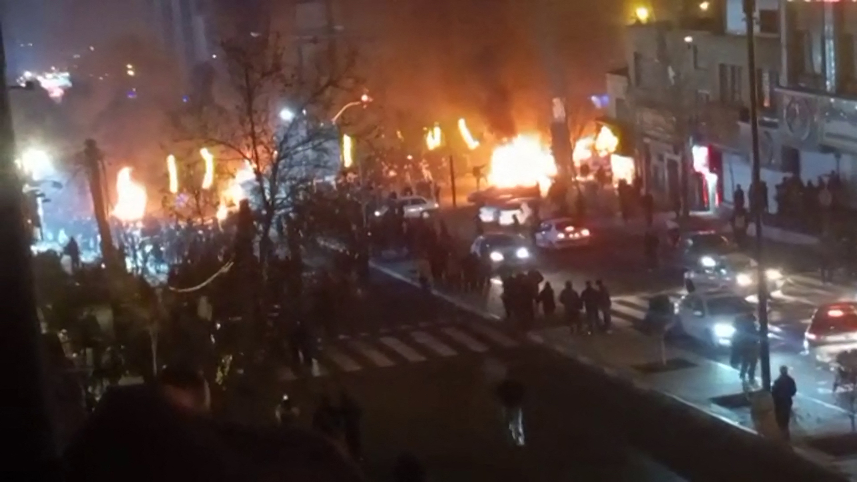 Cars set on fire during a protest.