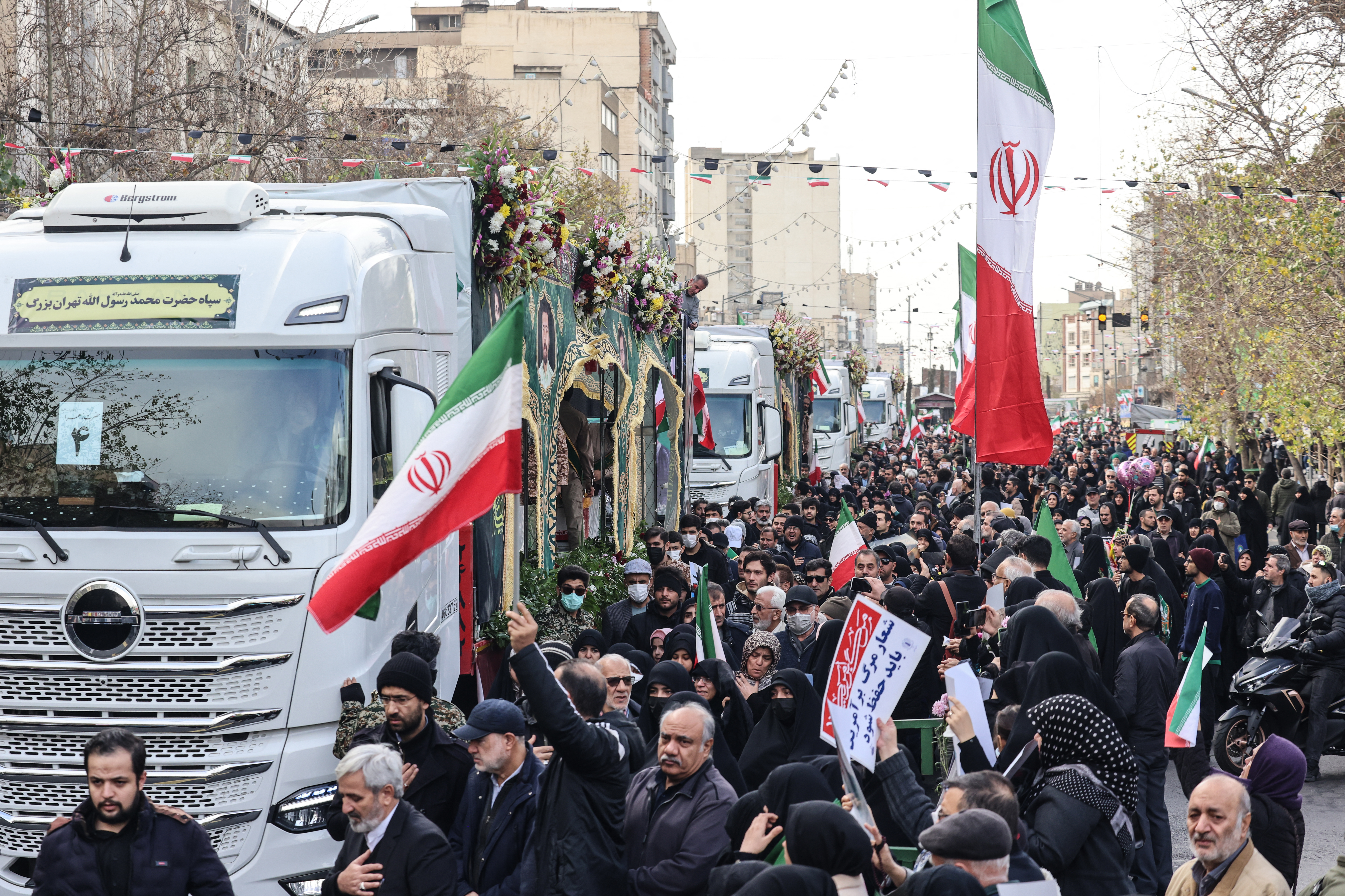 Iranians attend the funerals of security forces personnel killed in recent protests in Tehran on January 14, 2026.