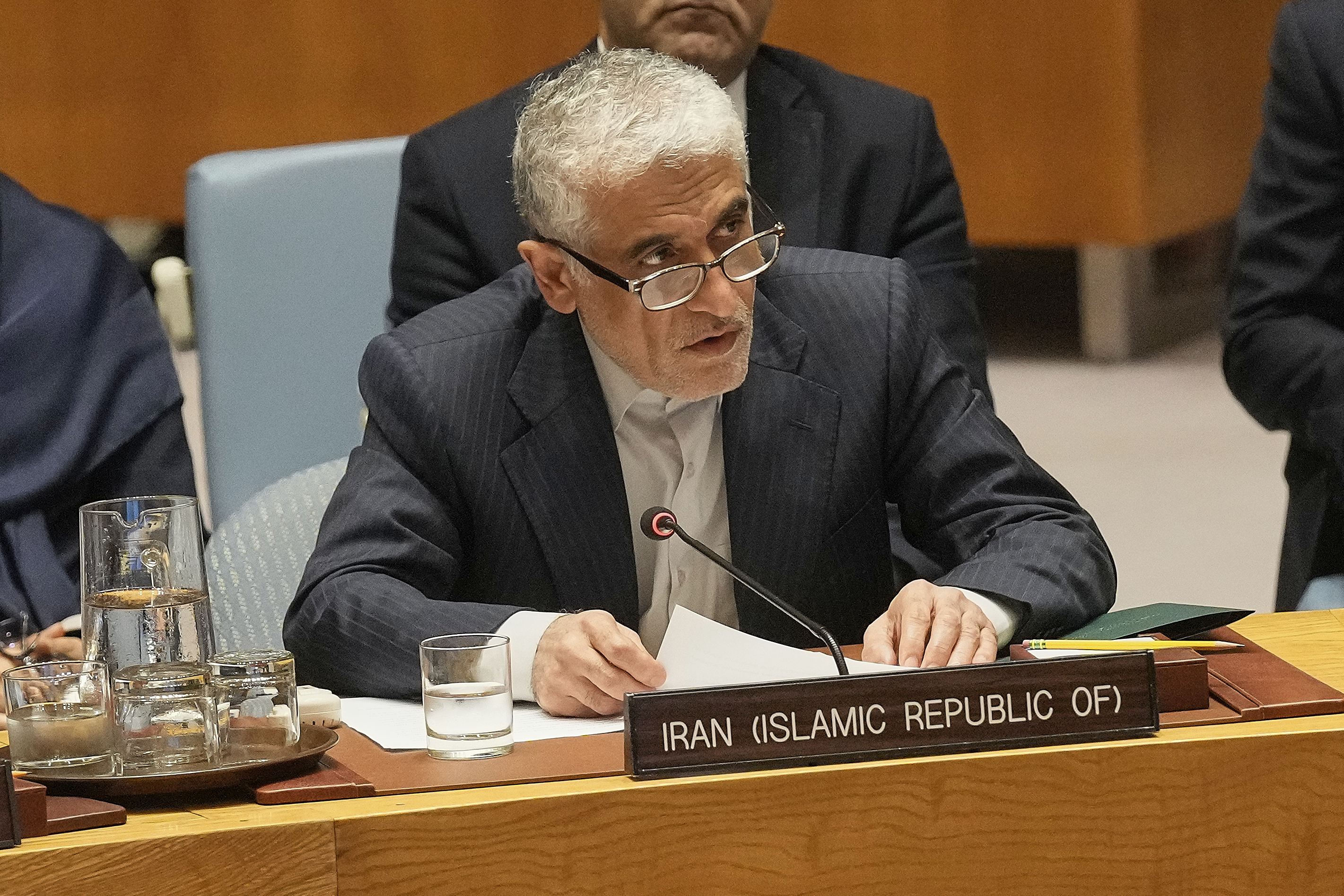 Iran UN Ambassador Amir Saeid Iravani addresses a United Nations Security Council meeting, Friday, June 20, 2025. (AP Photo/Richard Drew)