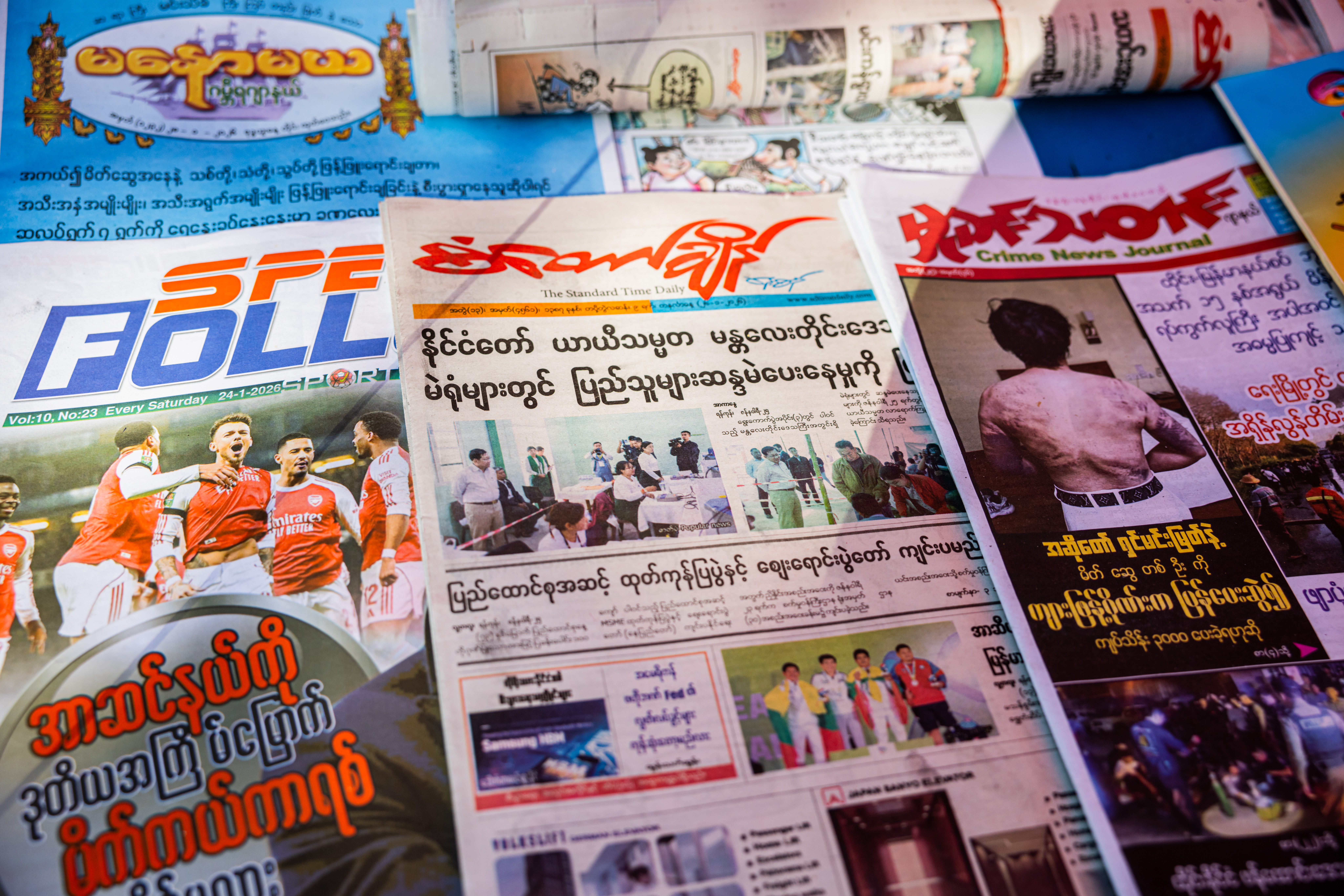YANGON, BURMA - JANUARY 26: Local newspapers feature headlines covering the conclusion of Myanmar's general election on January 26, 2026 in Yangon, Burma. Myanmar concluded its multi-phase general election on January 25, 2026, after voting began on December 28, 2025, under the military administration that took power in the 2021 coup and has overseen the country amid ongoing conflict. (Photo by Lauren DeCicca/Getty Images)