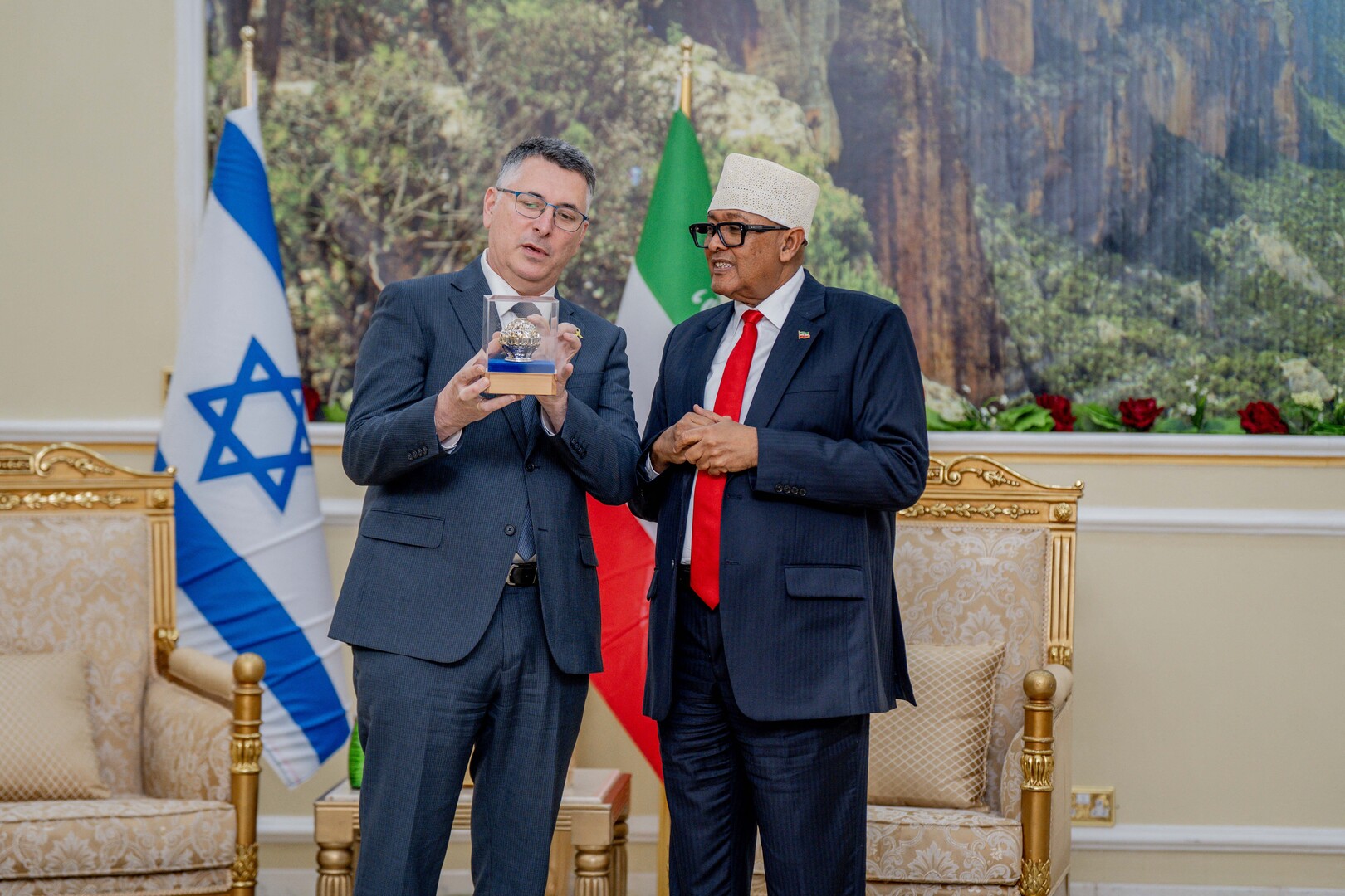 Somaliland President Abdirahman Abdullahi Mohamed (R) poses for a photograph with Israel's Foreign Minister Gideon Saar (L) at the Presidential Palace in Hargeisa. Israel's Foreign Minister arrived in Somaliland on Jan. 6, 2026 in the first high-profile visit by an Israeli official since the country recognised the breakaway region in the Horn of Africa, the Somaliland presidency said. [Somaliland Presidential Office/AFP]