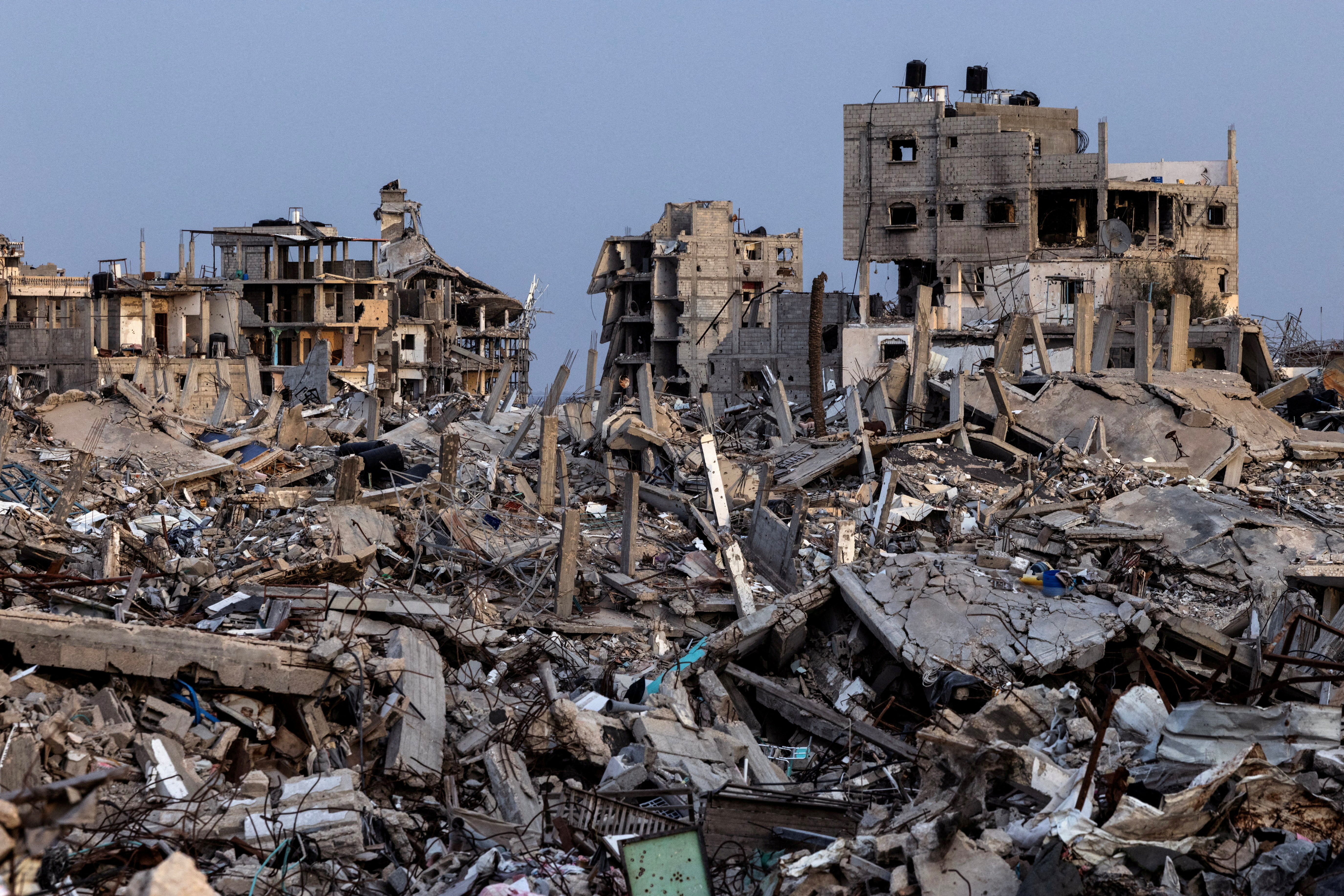 FILE PHOTO: Buildings lie in ruins amidst the rubble in Rafah in the southern Gaza Strip,
