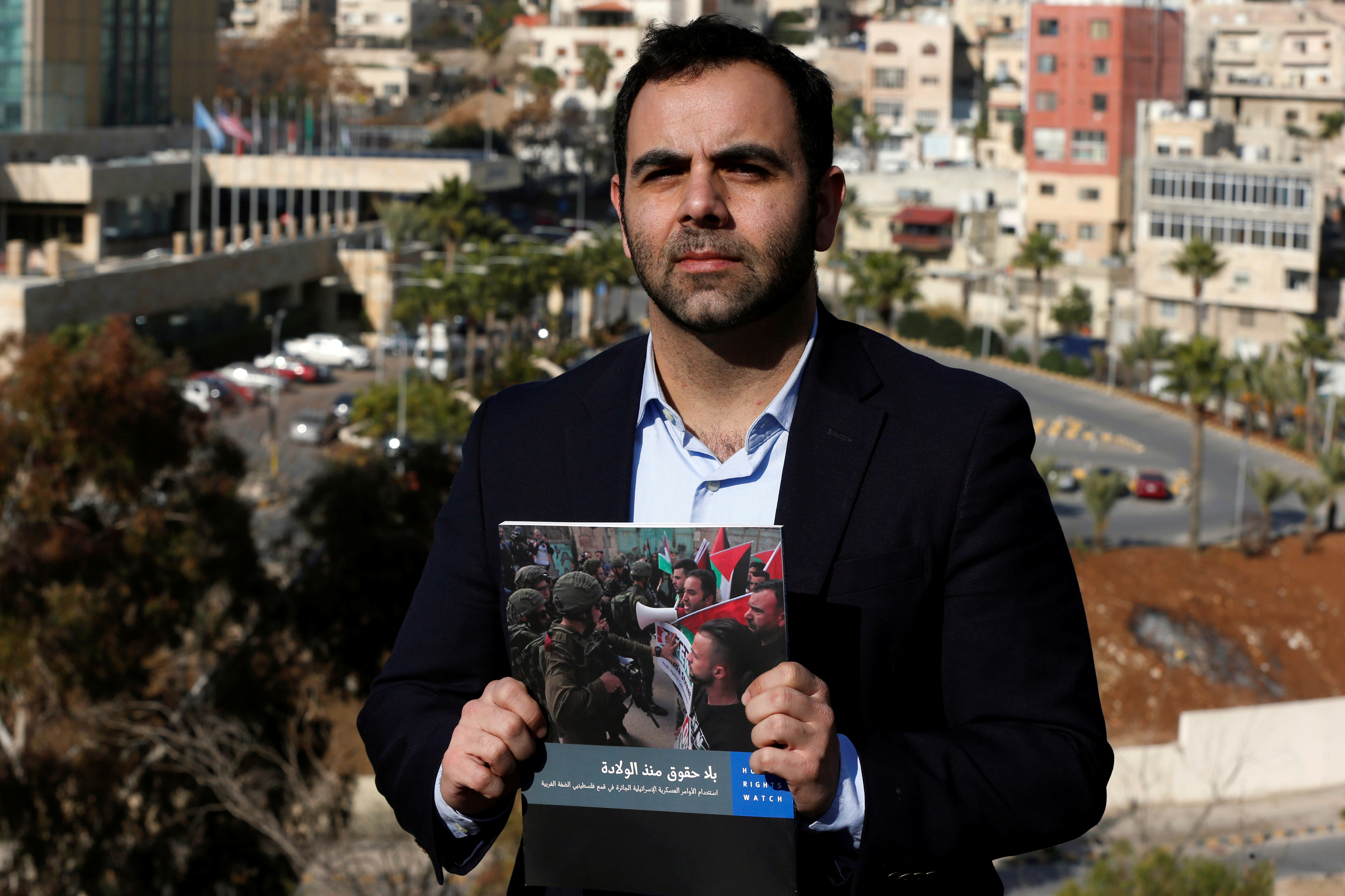 Omar Shakir, a U.S. citizen representing New York-based Human Rights Watch (HRW) in Israel and the Palestinian territories, speaks to Reuters TV in Amman, Jordan, December 17, 2019. REUTERS/Muhammad Hamed
