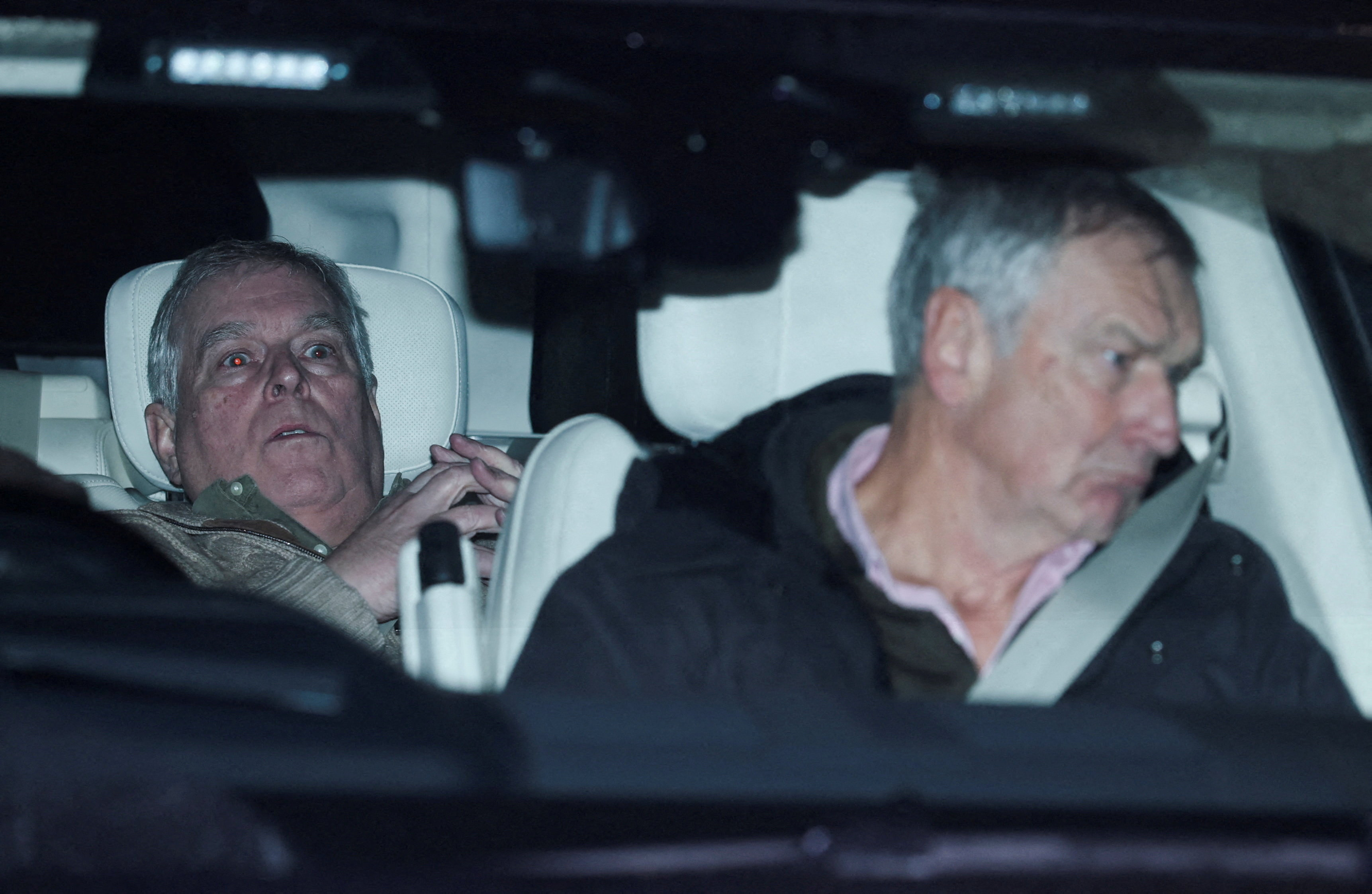 Prince Andrew in the back of a car
