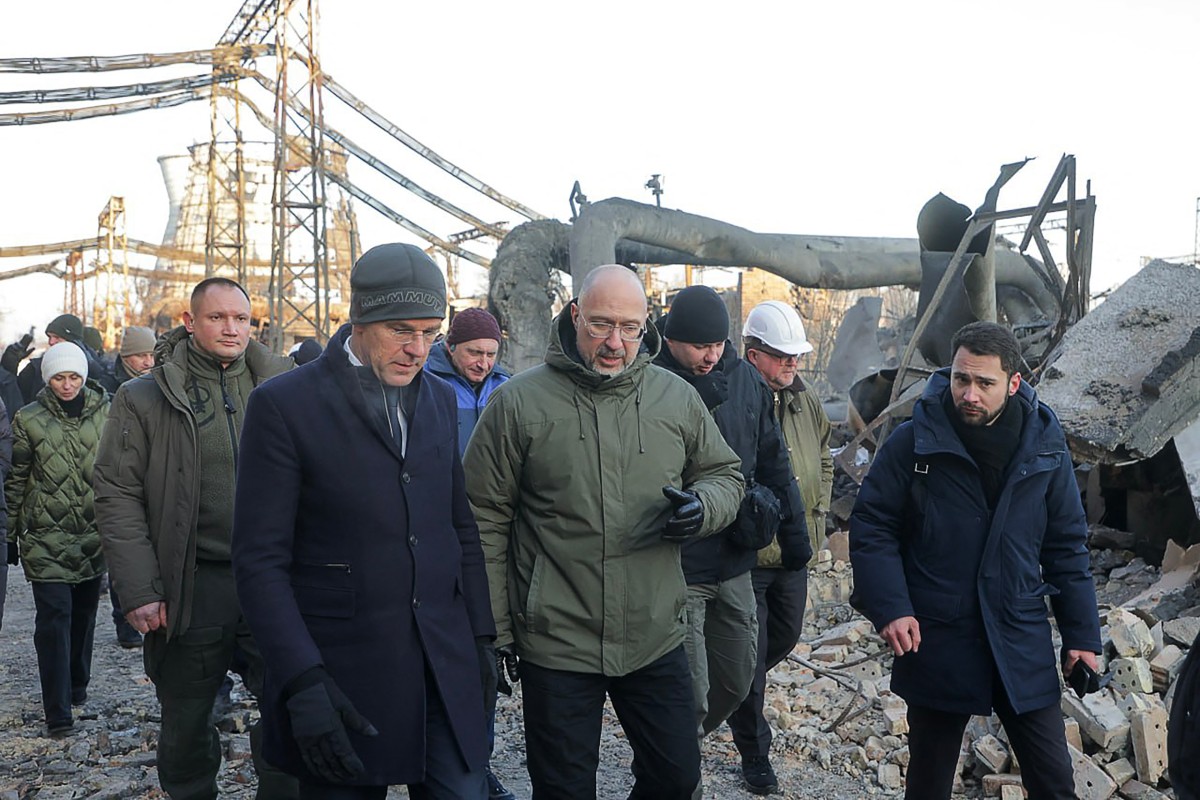 In this handout photograph released by the Telegram account of Ukraine's Minister of Energy Denys Shmyhal on February 3, 2026, shows Secretary General of NATO Mark Rutte (front L) and Ukraine's Minister of Energy Denys Shmyhal (C) during their visit to a combined heat and power (CHP) plant damaged by Russian air attacks in an undisclosed location in Kyiv.NATO chief Mark Rutte said on a visit to Kyiv on February 3, 2026 that Russia's overnight attacks did not suggest Moscow was serious about making peace, as the United States pushes talks to stop the fighting.