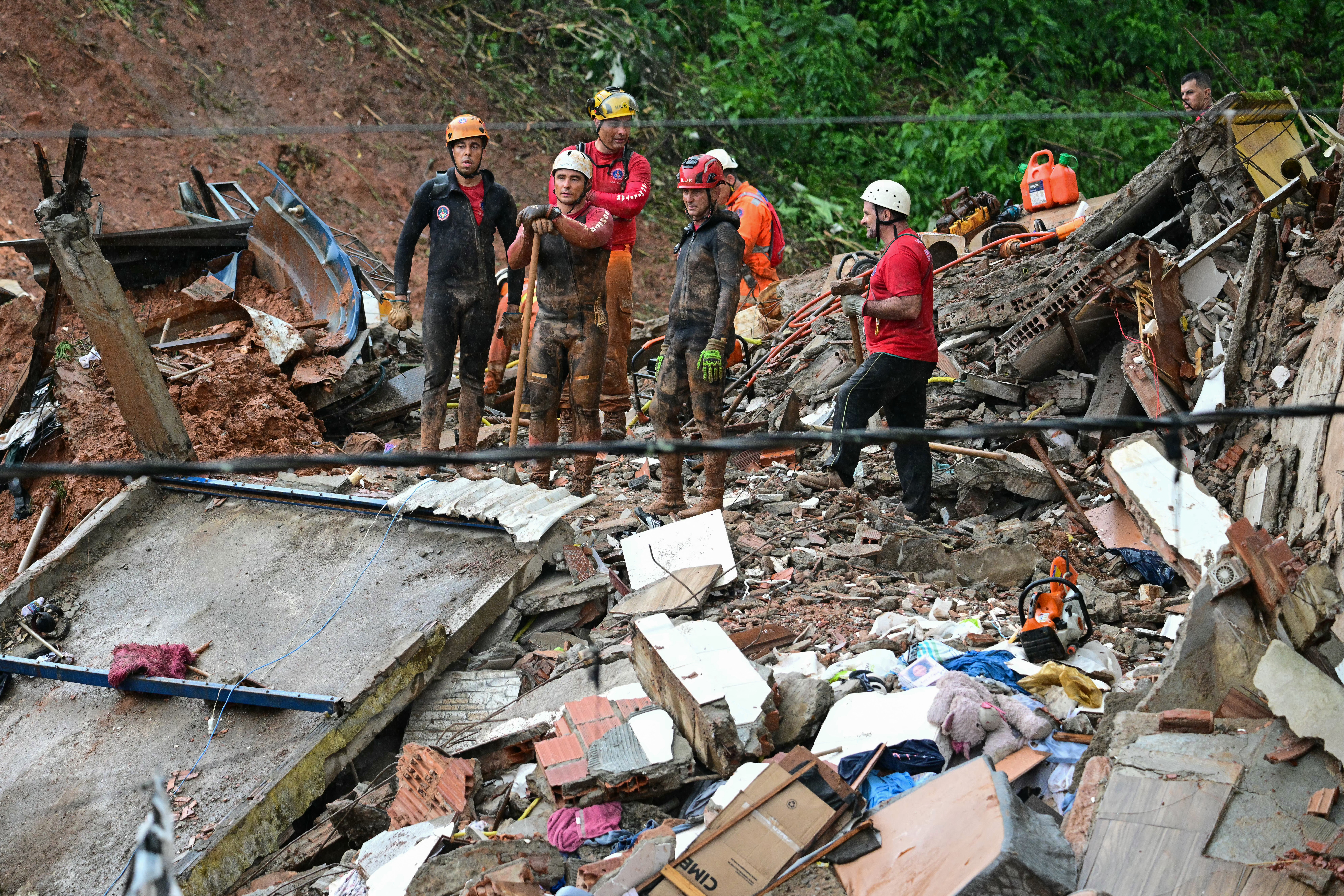 Rescuers search for missing after deluge kills 30 in Brazil