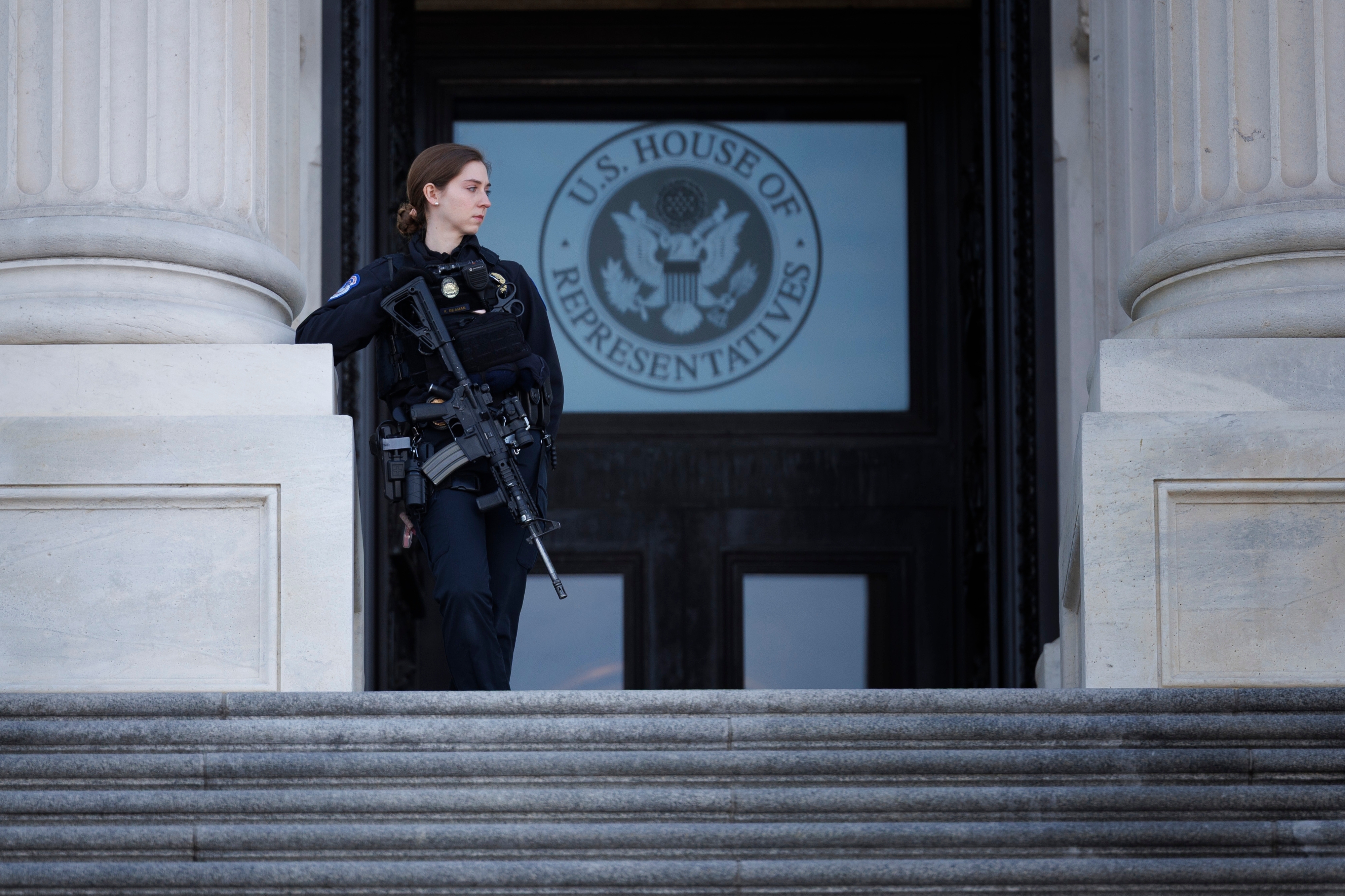 A U.S Capitol Police officer stands guard outside the U.S. House of Representatives on Capitol Hill, Tuesday, Feb. 10, 2026, in Washington. (AP Photo/Tom Brenner)