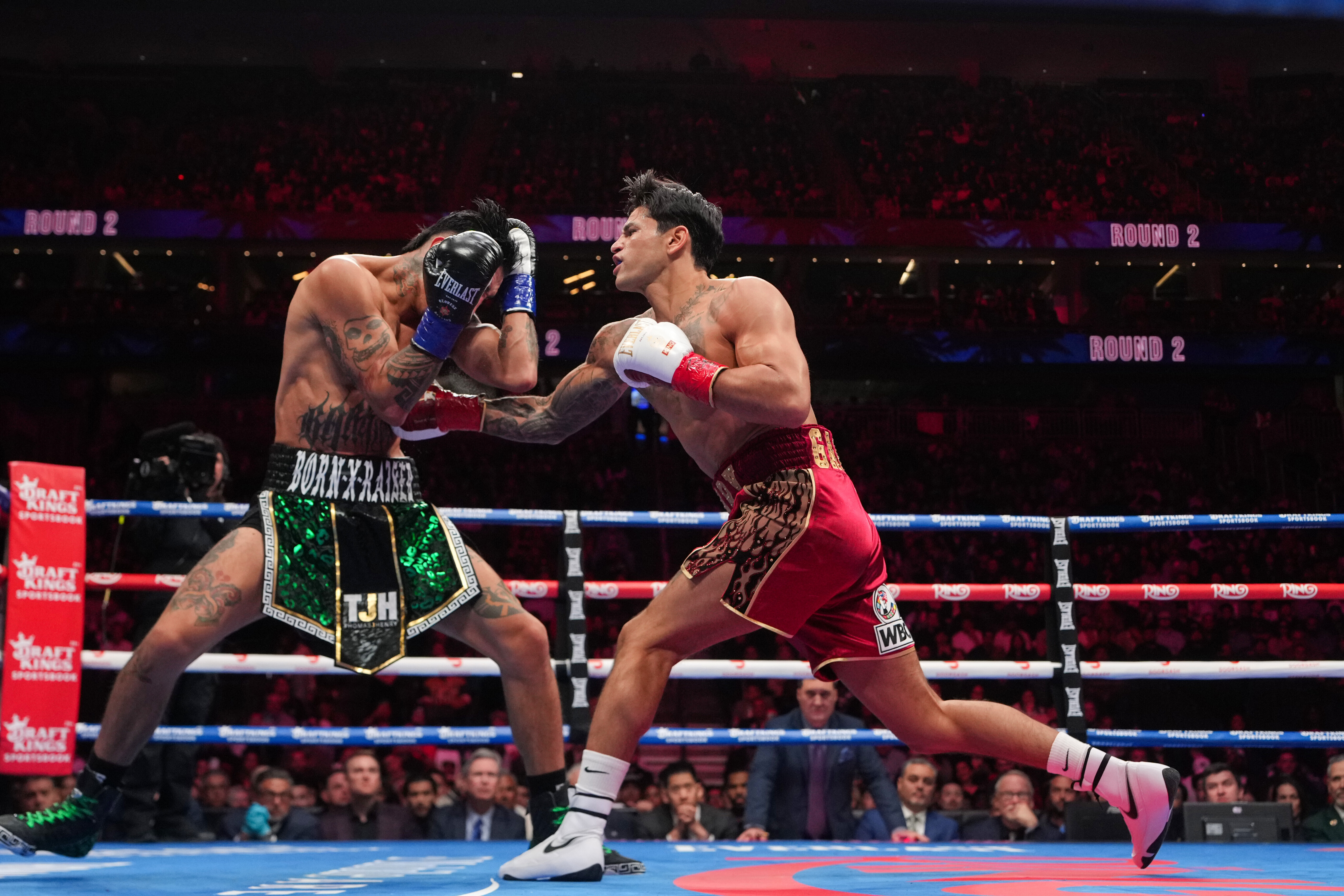 Ryan Garcia and Mario Barrios in action.