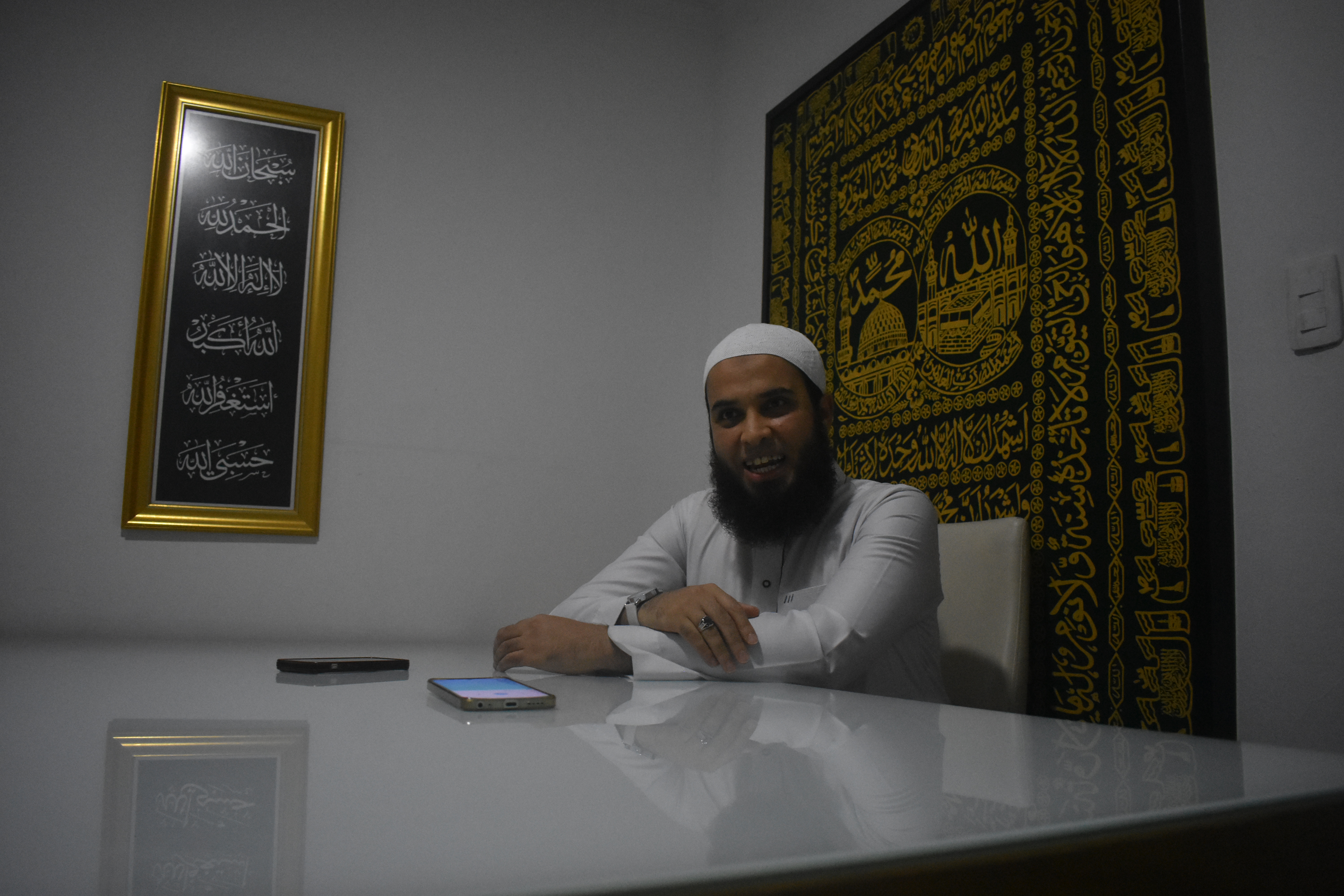 Imam Mu’tasem Abdo speaks in his office
