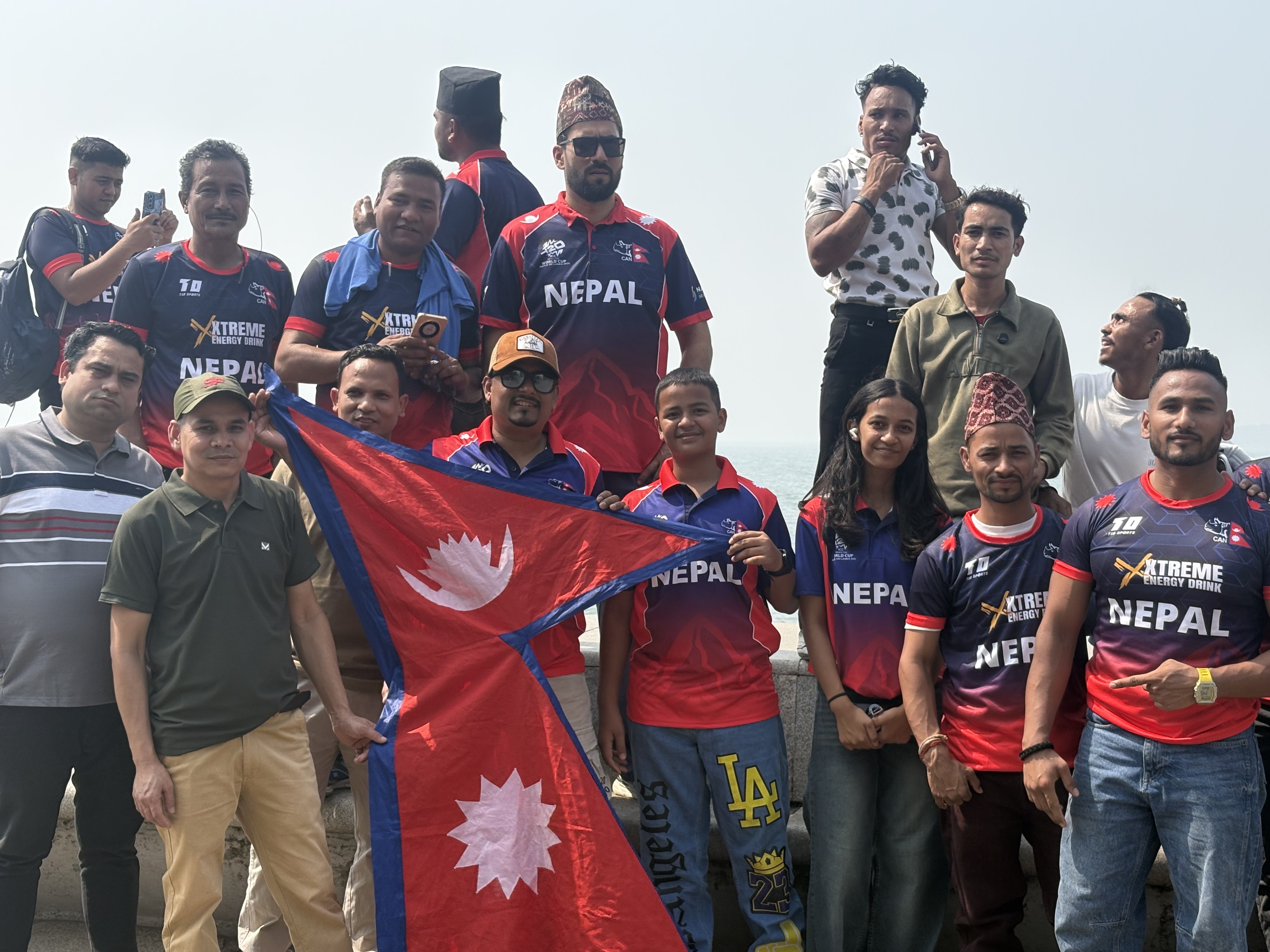 Nepal fans gather outside the Wankhede Stadium around Marine Drive in Mumbai [Manasi Pathak/Al Jazeera]