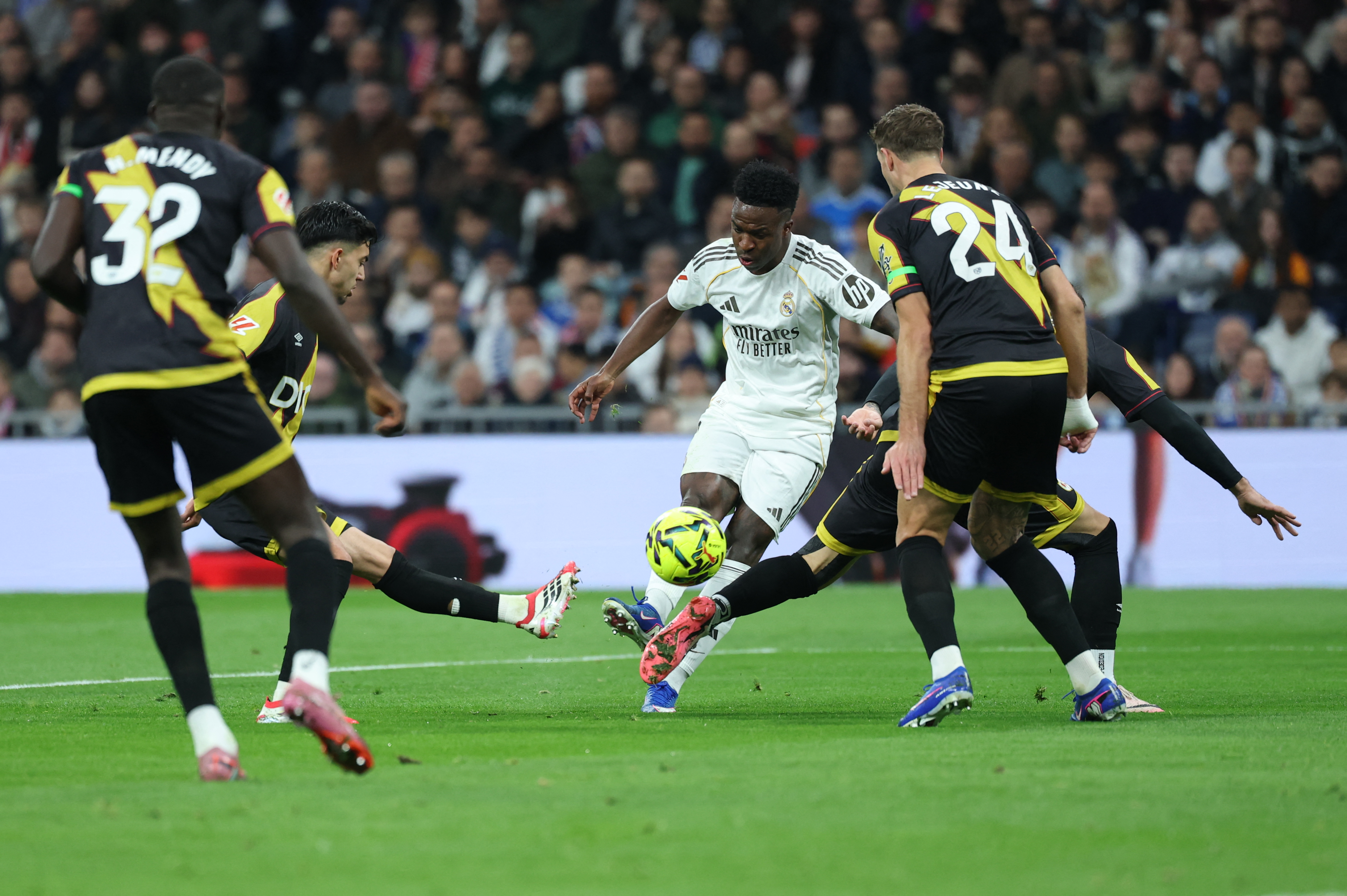 Real Madrid's Brazilian forward #07 Vinicius Junior scores the opening goal during the Spanish league football match between Real Madrid CF and Rayo Vallecano at the Santiago Bernabeu stadium in Madrid on February 1, 2026. (Photo by Thomas COEX / AFP)