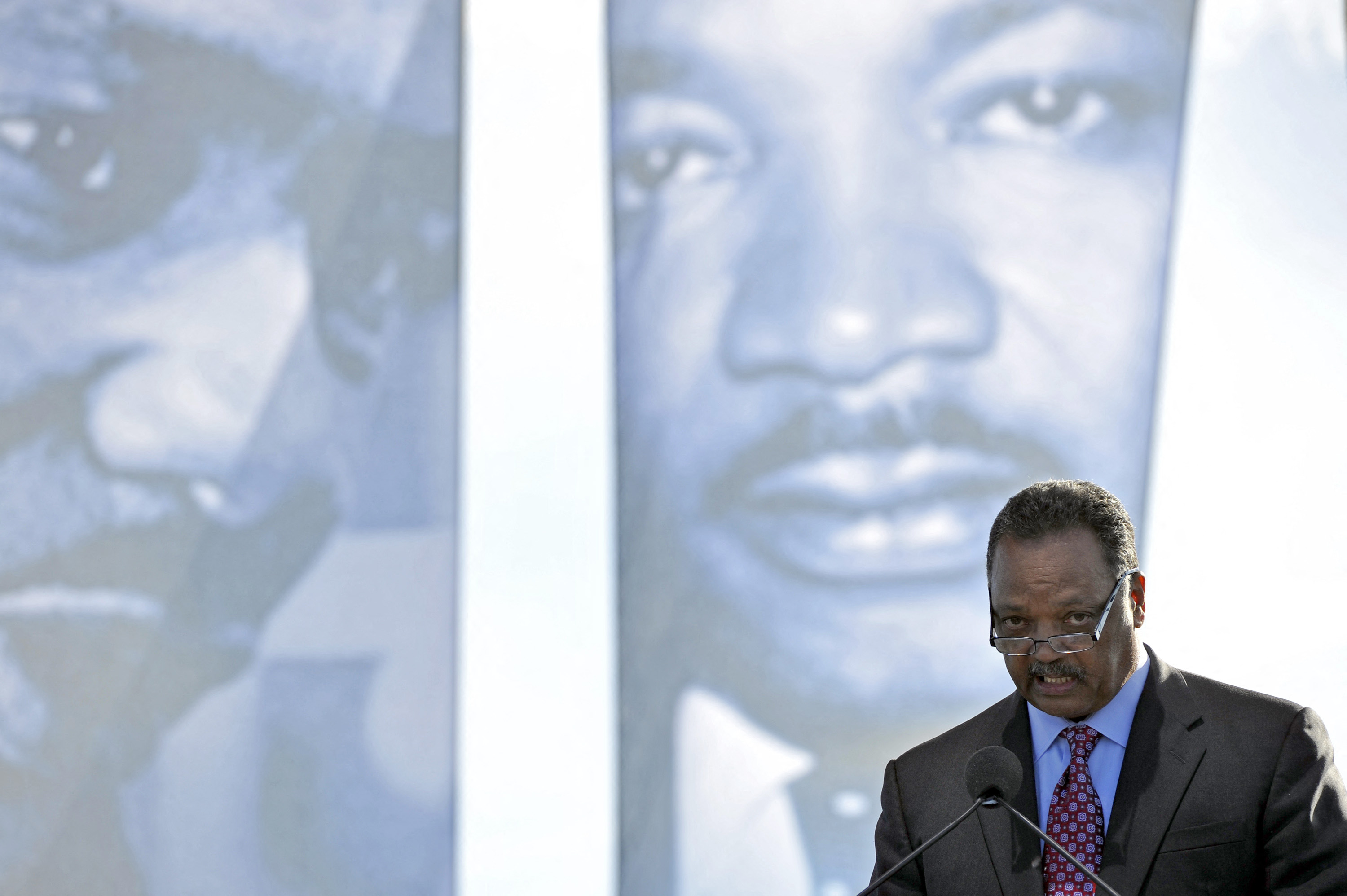 (FILES) Reverend Jesse Jackson speaks to the crowd at the Martin Luther King, Jr. Memorial Dedication ceremony in Washington, DC on October 16, 2011. The long awaited dedication of the US national memorial to slain civil rights icon Martin Luther King had been rescheduled from the 48th anniversary date of King's "I Have A Dream" speech due to Hurricane Irene.