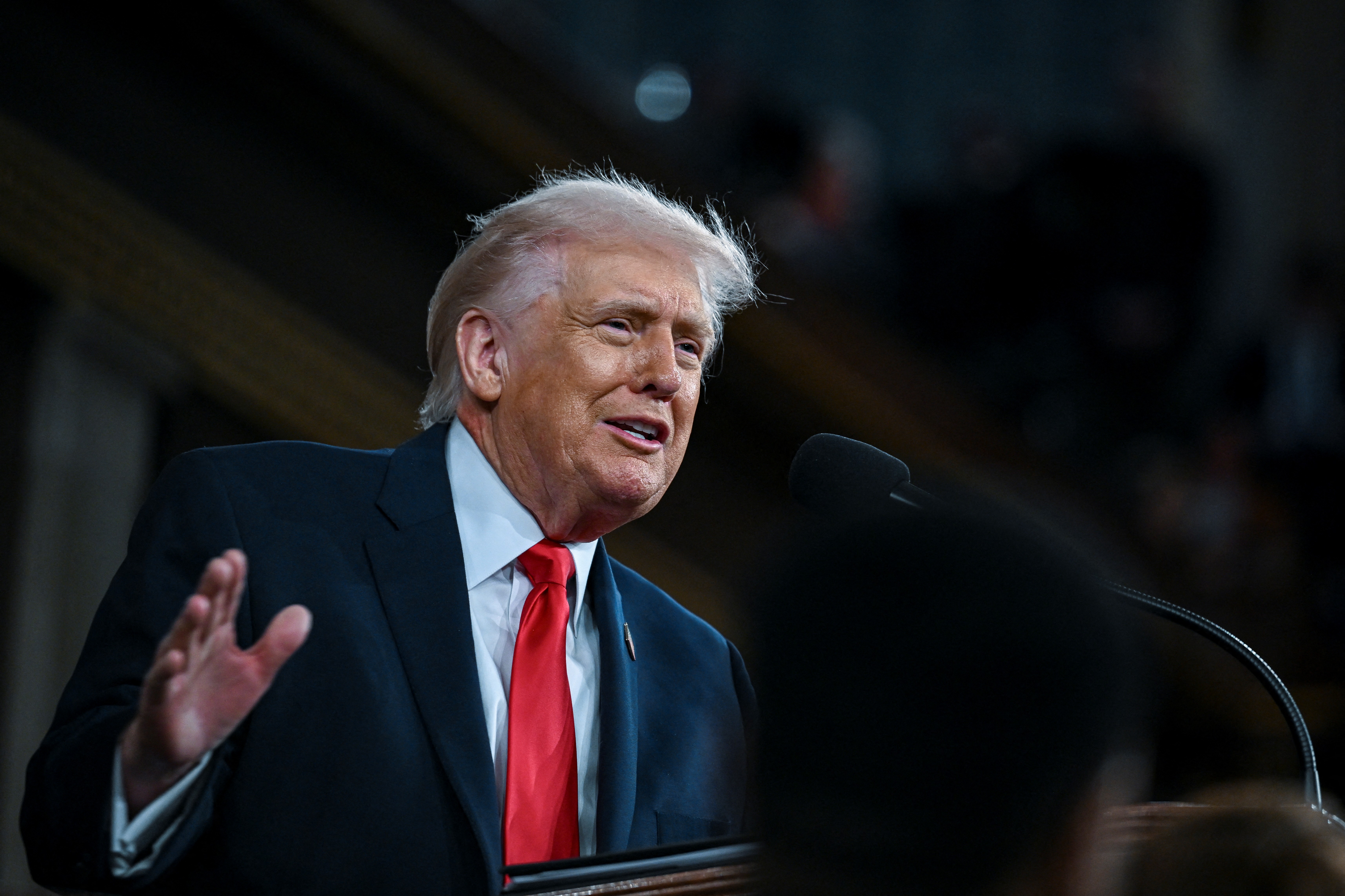 US President Donald Trump delivers the first State of the Union address of his second term to a joint session of Congress in the House Chamber of the United States Capitol in Washington, DC, on February 24, 2026. (Photo by Kenny HOLSTON / POOL / AFP)