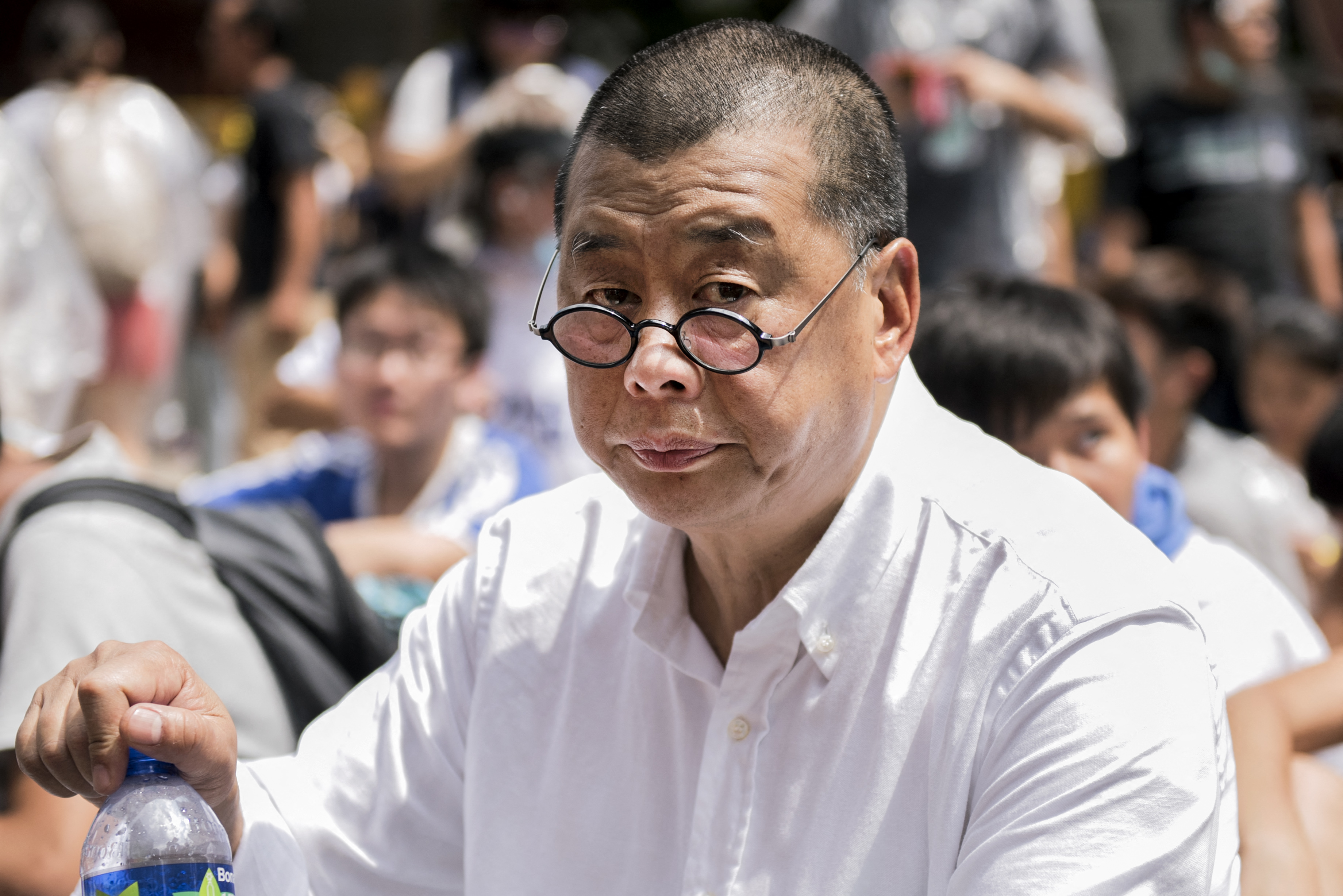 (FILES) Hong Kong media tycoon and pro-democracy supporter Jimmy Lai attends a rally near the government headquarters in Hong Kong on September 28, 2014.