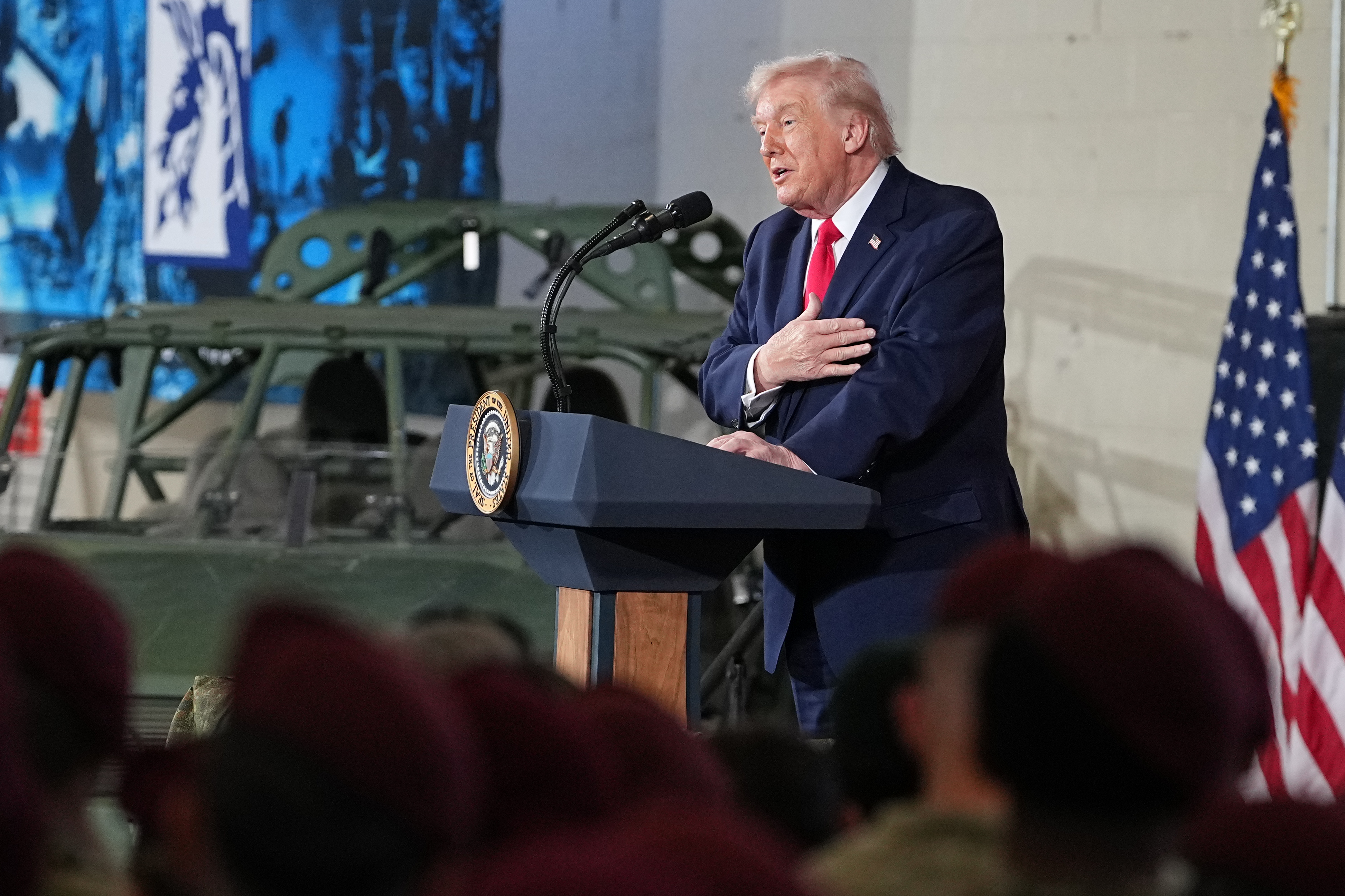 President Donald Trump speaks to soldiers and their families at Fort Bragg, N.C., Friday, Feb. 13, 2026. (AP Photo/Matt Rourke)