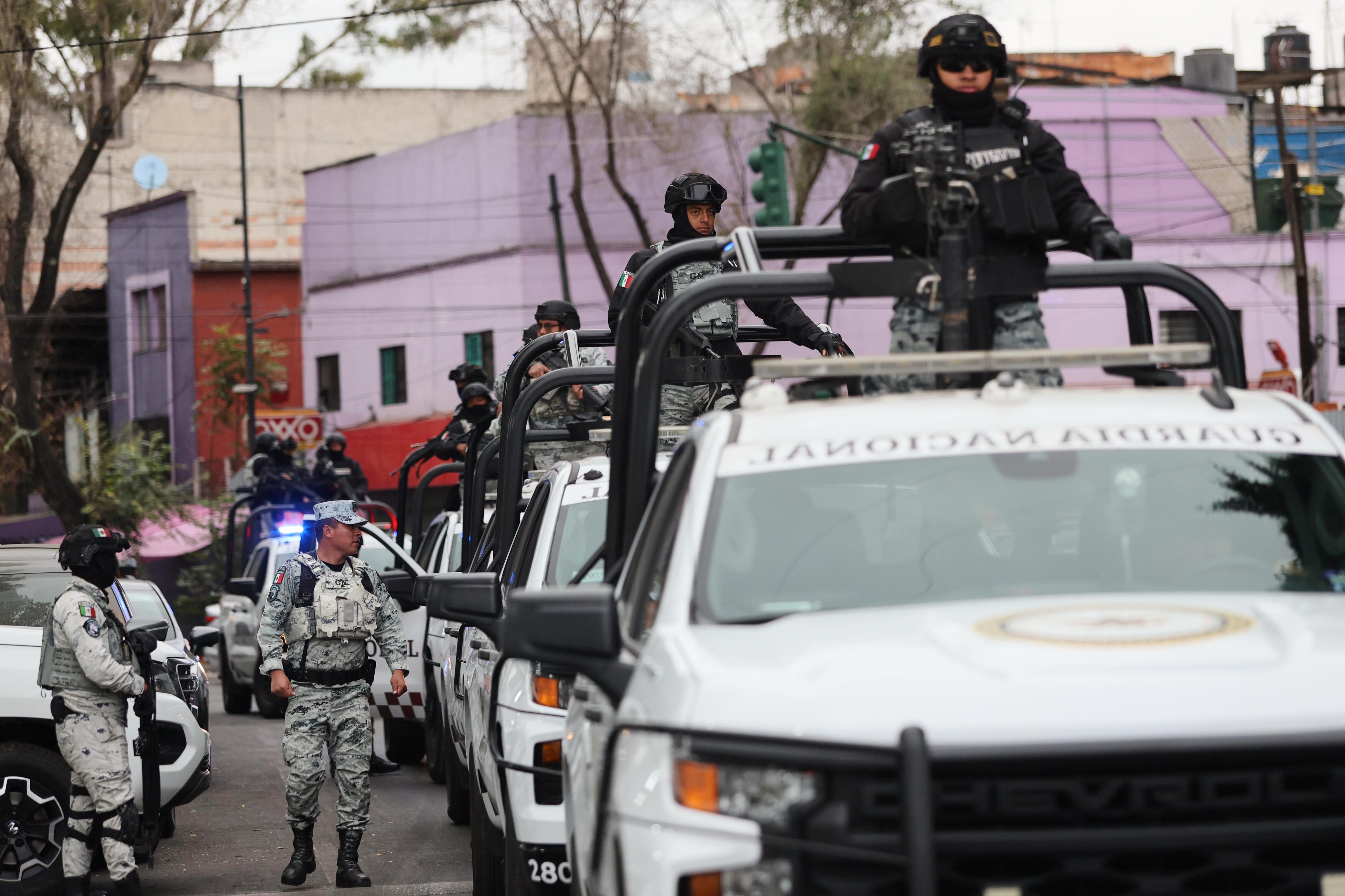 National Guard members patrol the area outside the General Prosecutor's headquarters in Mexico City