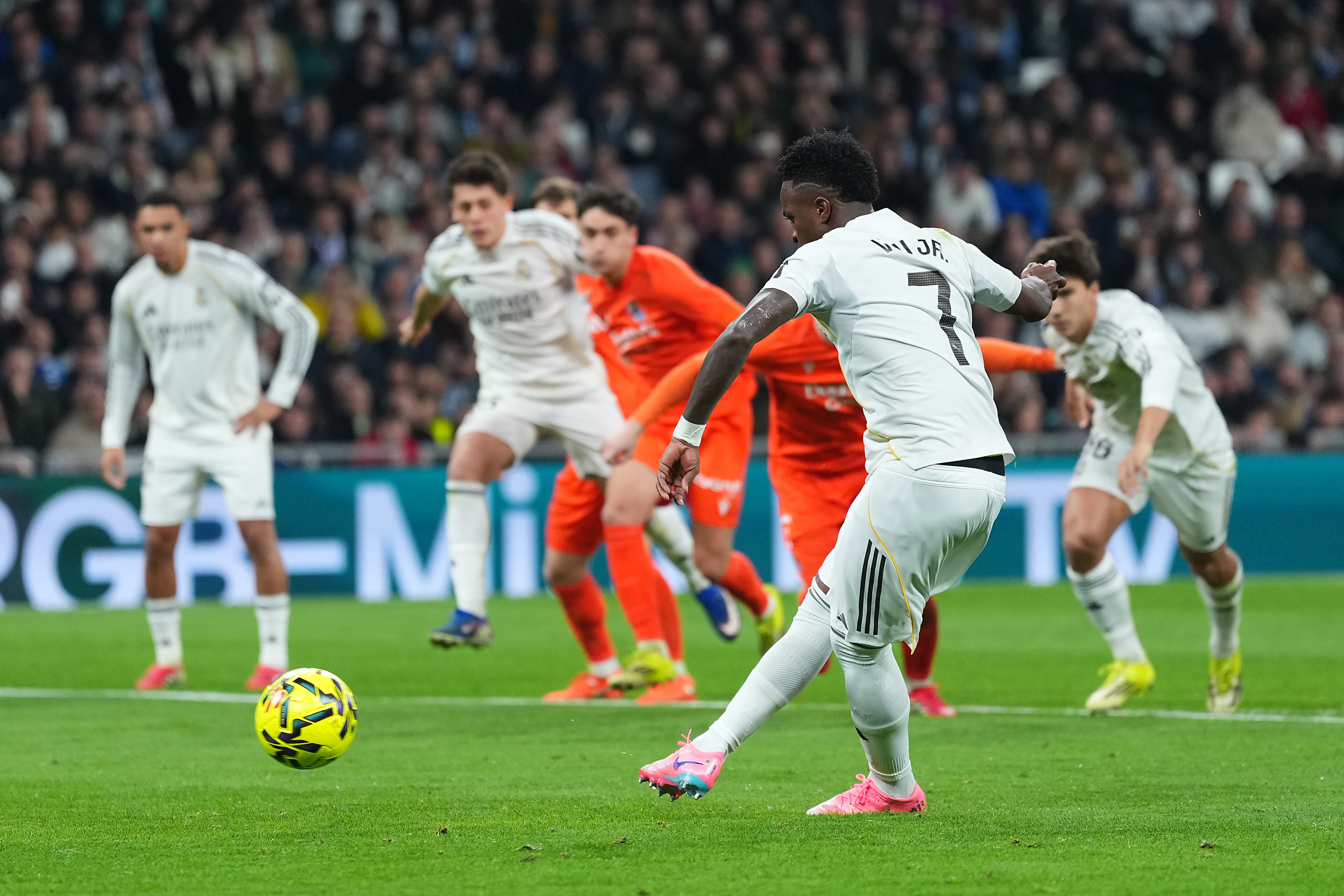 MADRID, SPAIN - FEBRUARY 14: Vinicius Junior of Real Madrid scores his team's fourth goal from the penalty spot during the LaLiga EA Sports match between Real Madrid CF and Real Sociedad at Estadio Santiago Bernabeu on February 14, 2026 in Madrid, Spain. (Photo by Angel Martinez/Getty Images)