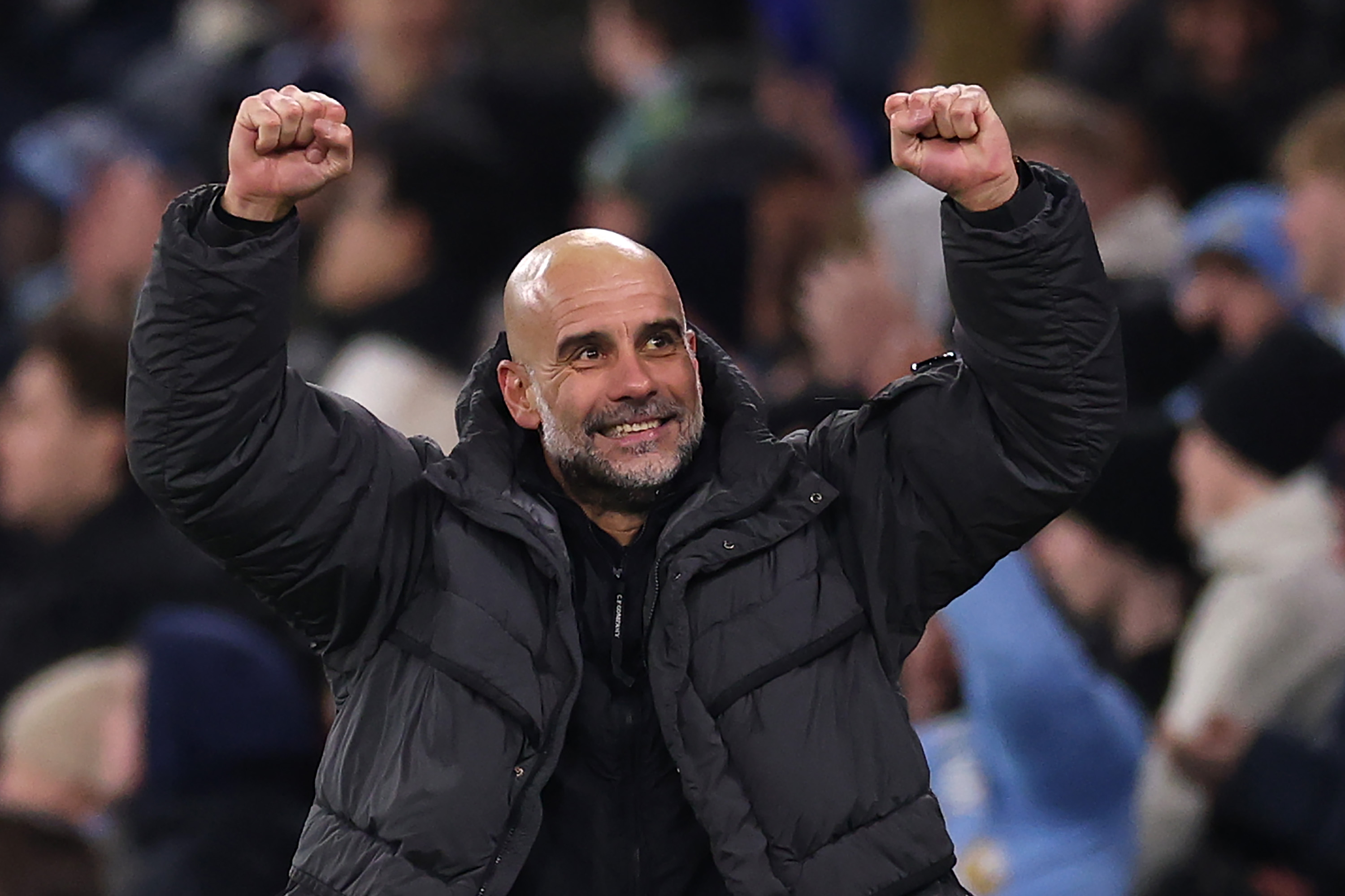 MANCHESTER, ENGLAND - FEBRUARY 04: Pep Guardiola, Manager of Manchester City, celebrates his team's third goal, scored by Tijjani Reijnders (not pictured) during the Carabao Cup Semi Final Second Leg match between Manchester City and Newcastle United at Etihad Stadium on February 04, 2026 in Manchester, England. (Photo by Kate McShane/Getty Images)