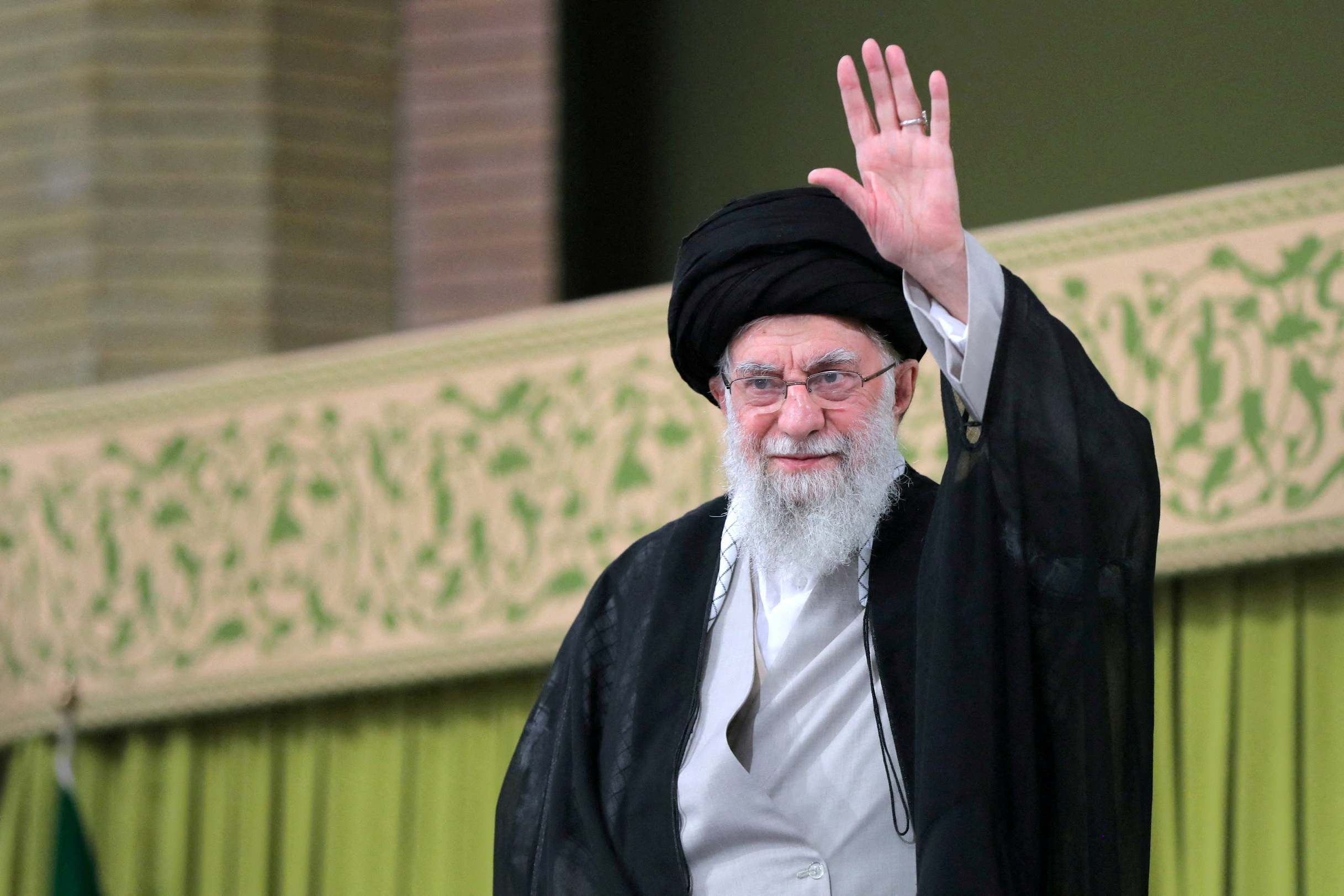 Iran's Supreme Leader Ayatollah Ali Khamenei waves during a meeting with students in Tehran, Iran, November 2, 2024.